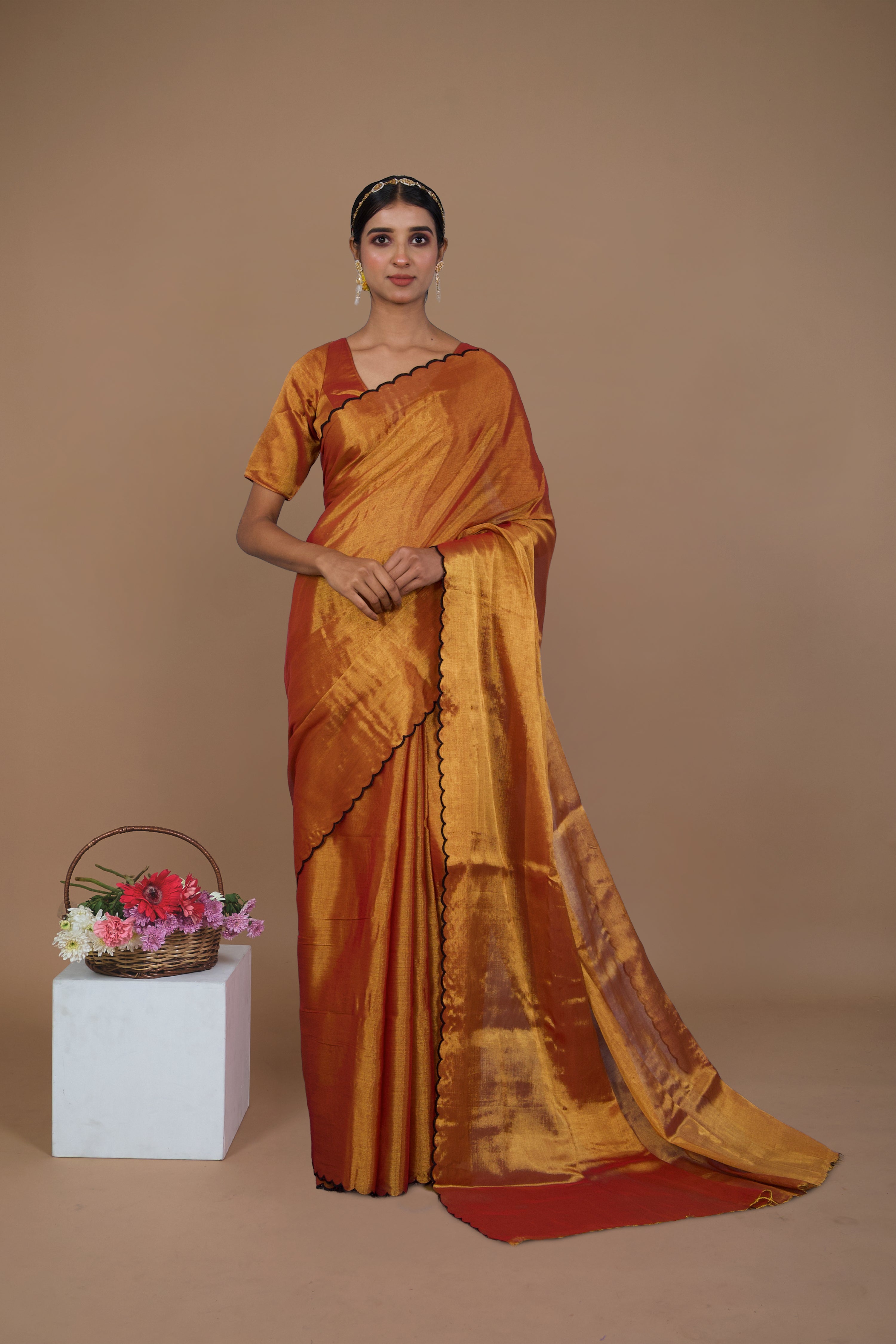 Lalitya I Rust gold handwoven tissue saree with scalloped pallu and border