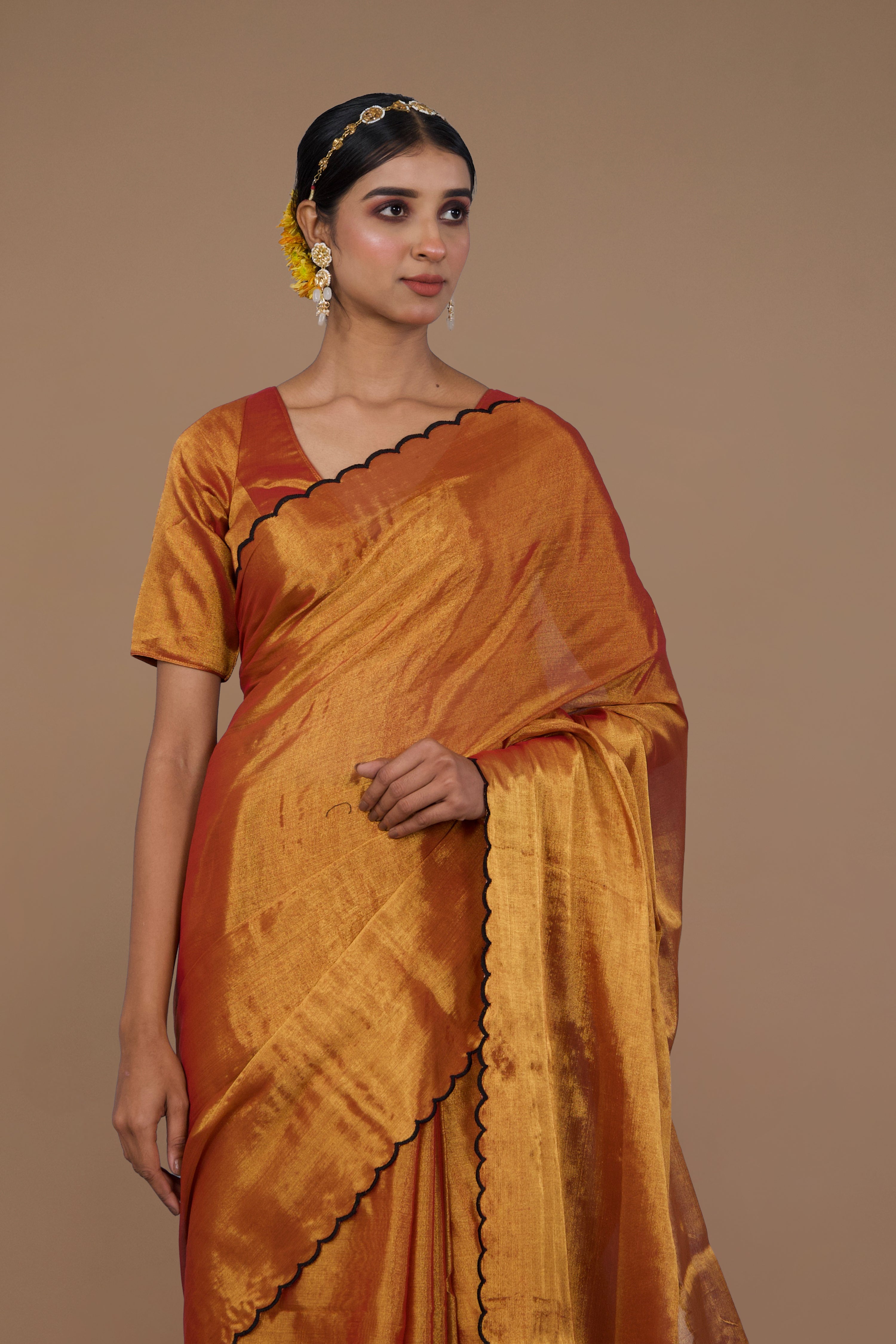 Lalitya I Rust gold handwoven tissue saree with scalloped pallu and border