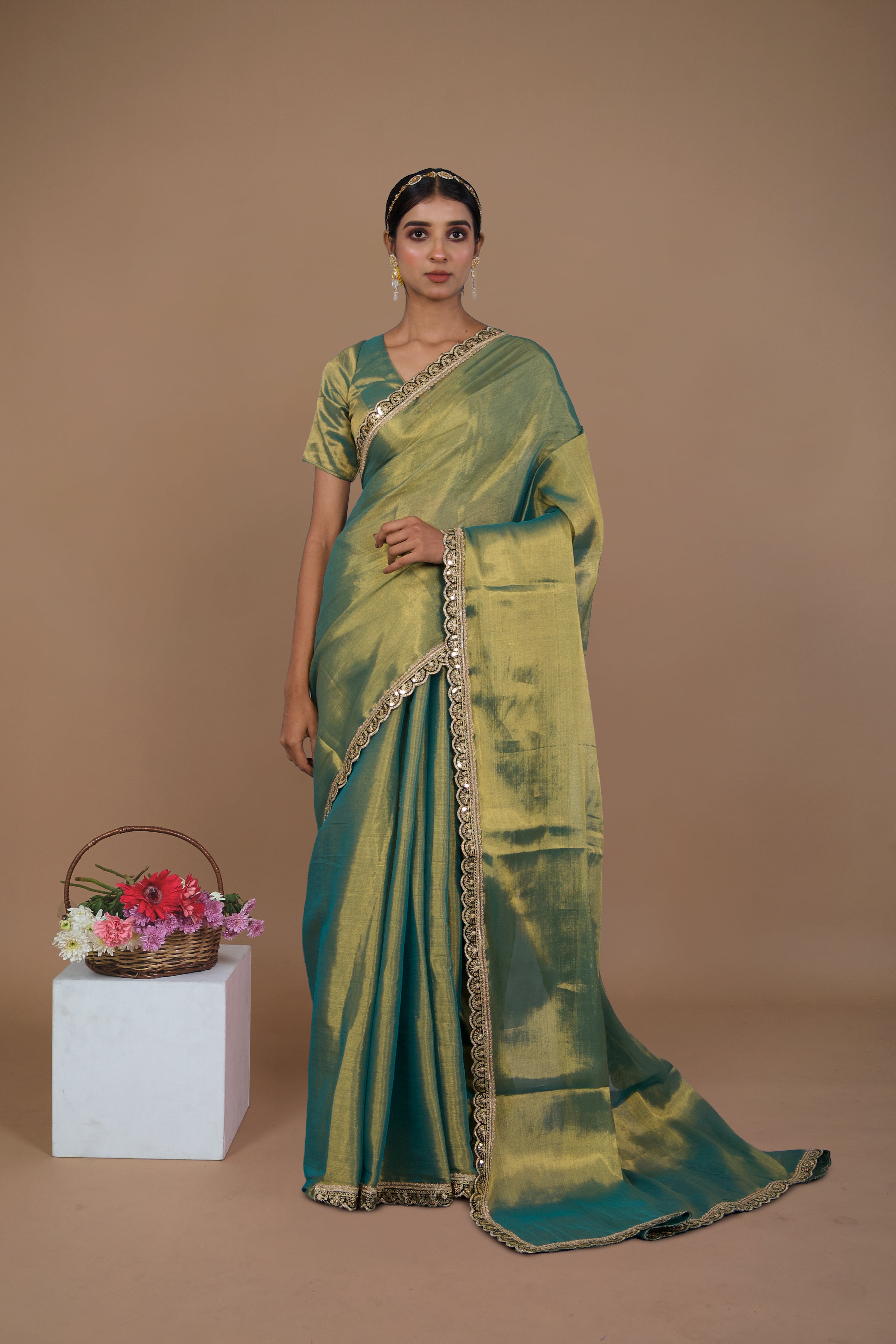 Ritika I Sea green handwoven tissue saree with scalloped lace