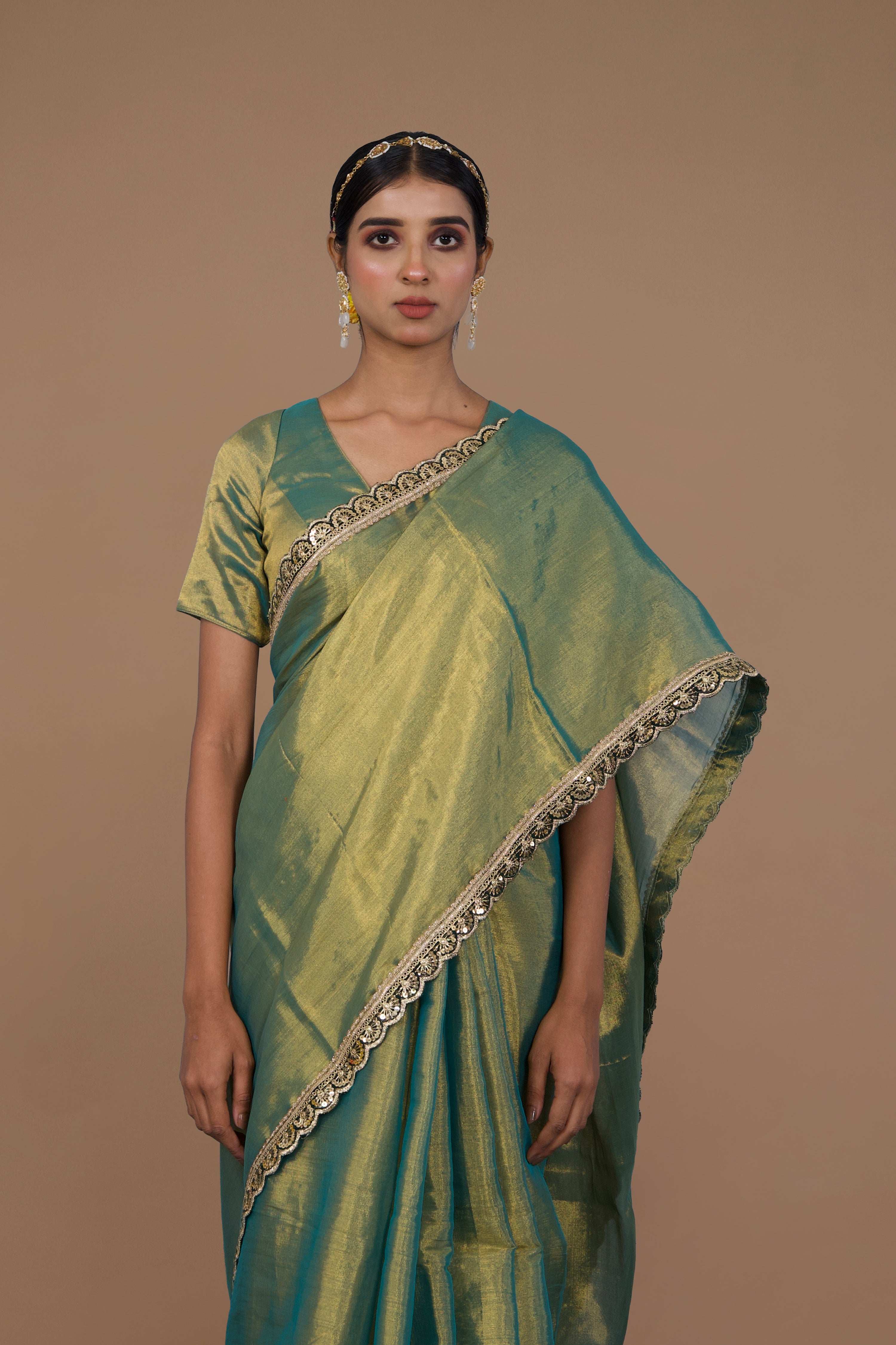 Ritika I Sea green handwoven tissue saree with scalloped lace