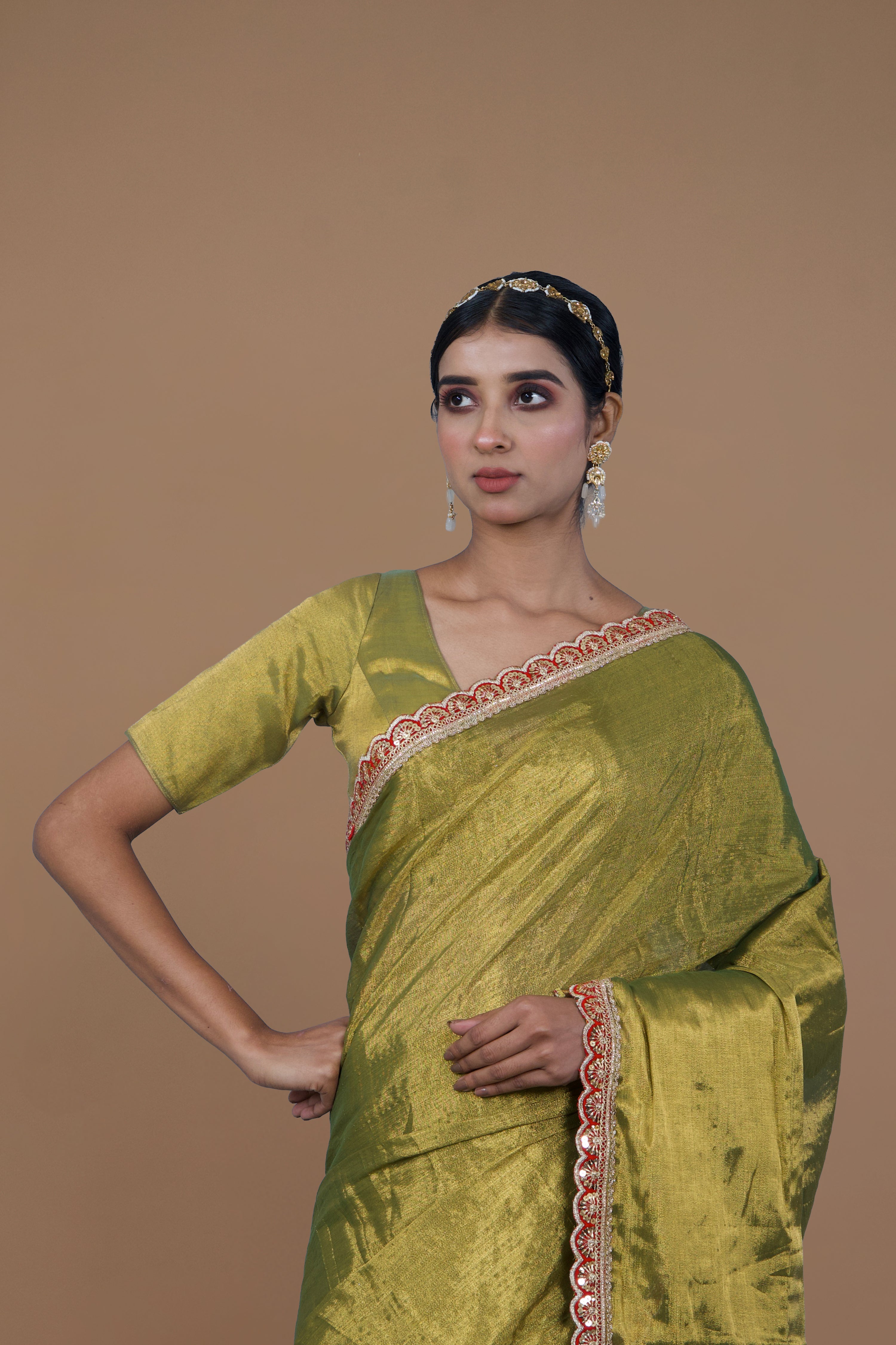 Yashvi I Olive Green handwoven tissue saree with scalloped lace