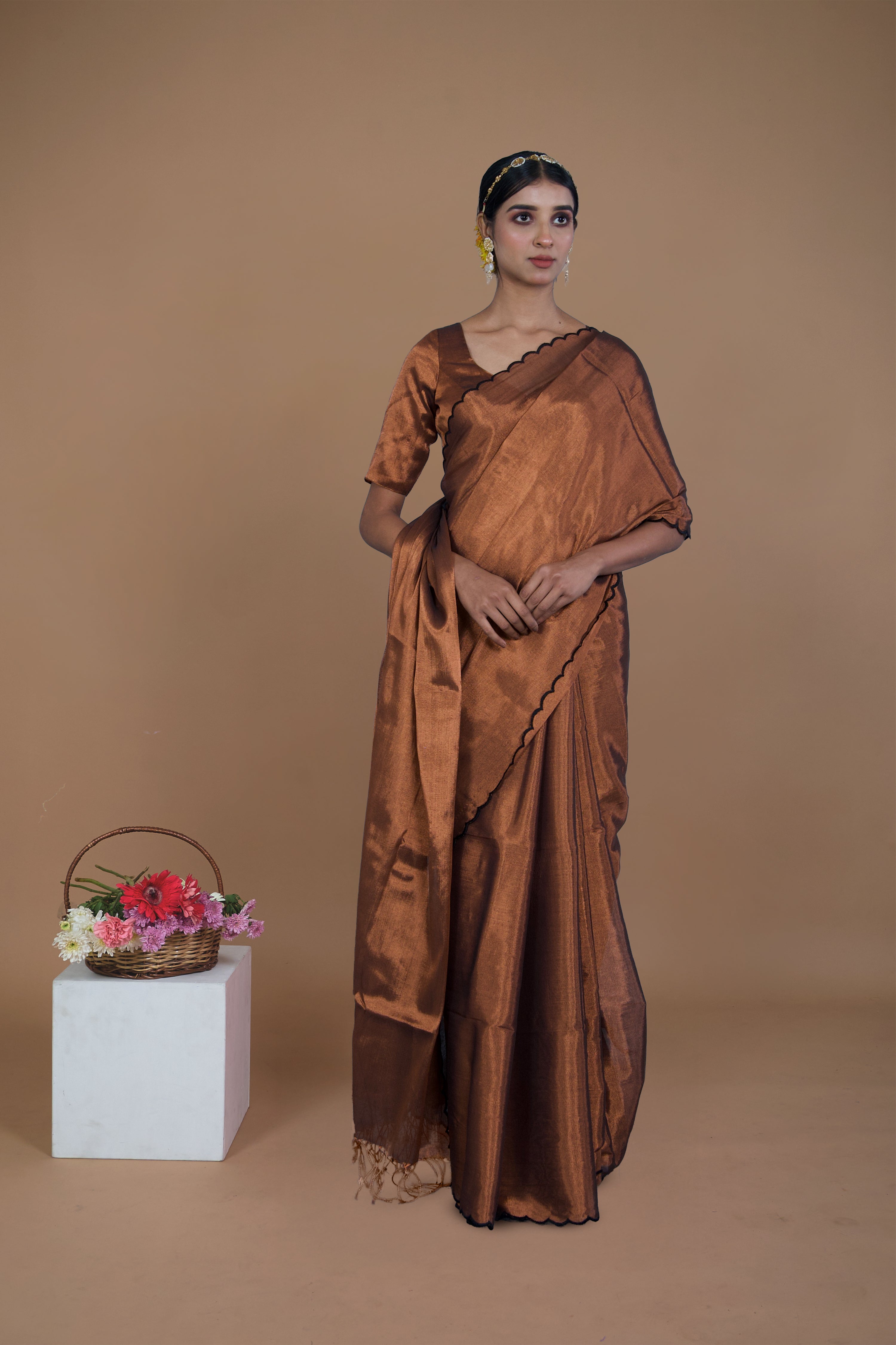 Shaili I Copper handwoven tissue saree with scalloped pallu and border
