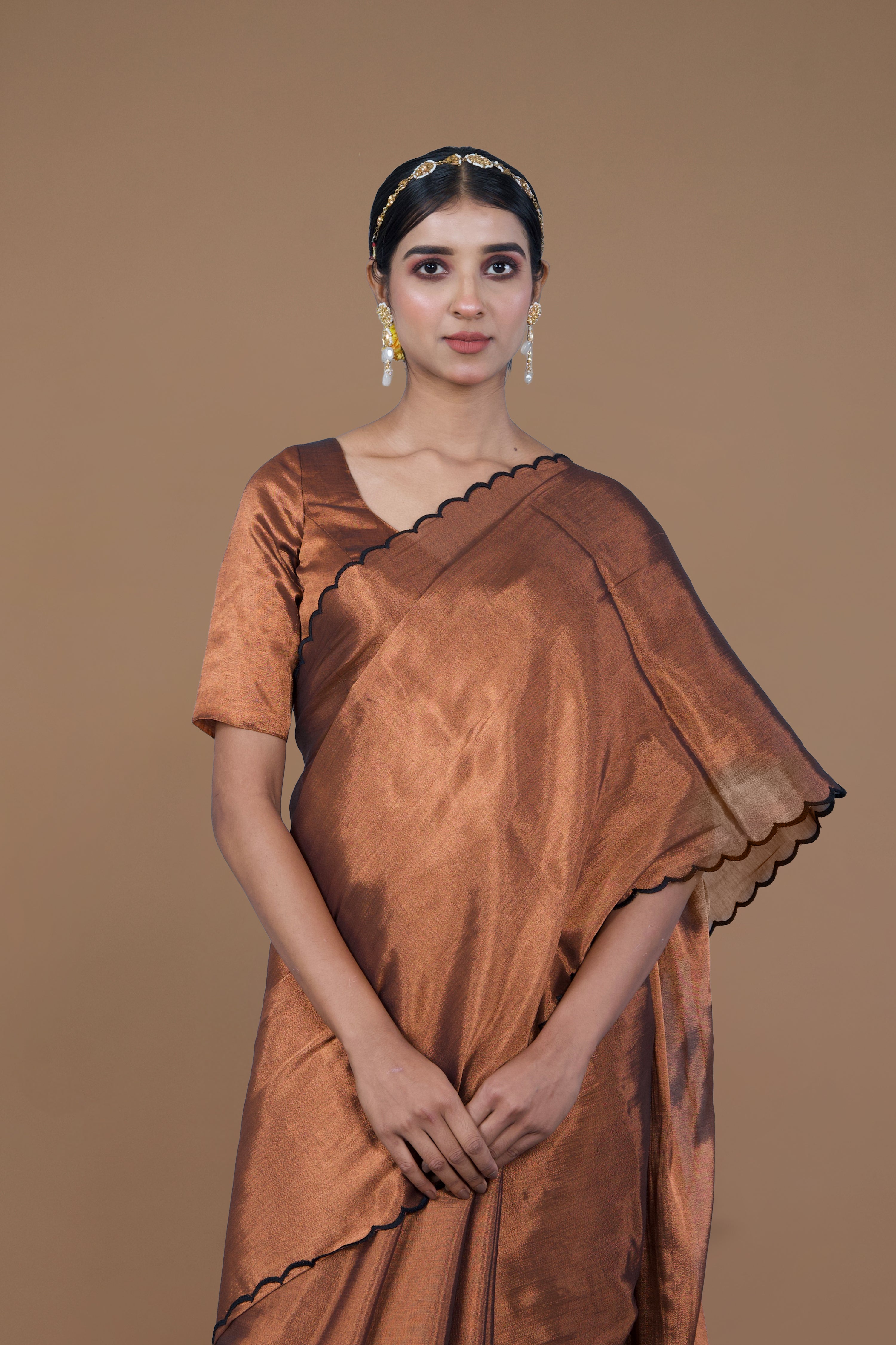 Shaili I Copper handwoven tissue saree with scalloped pallu and border