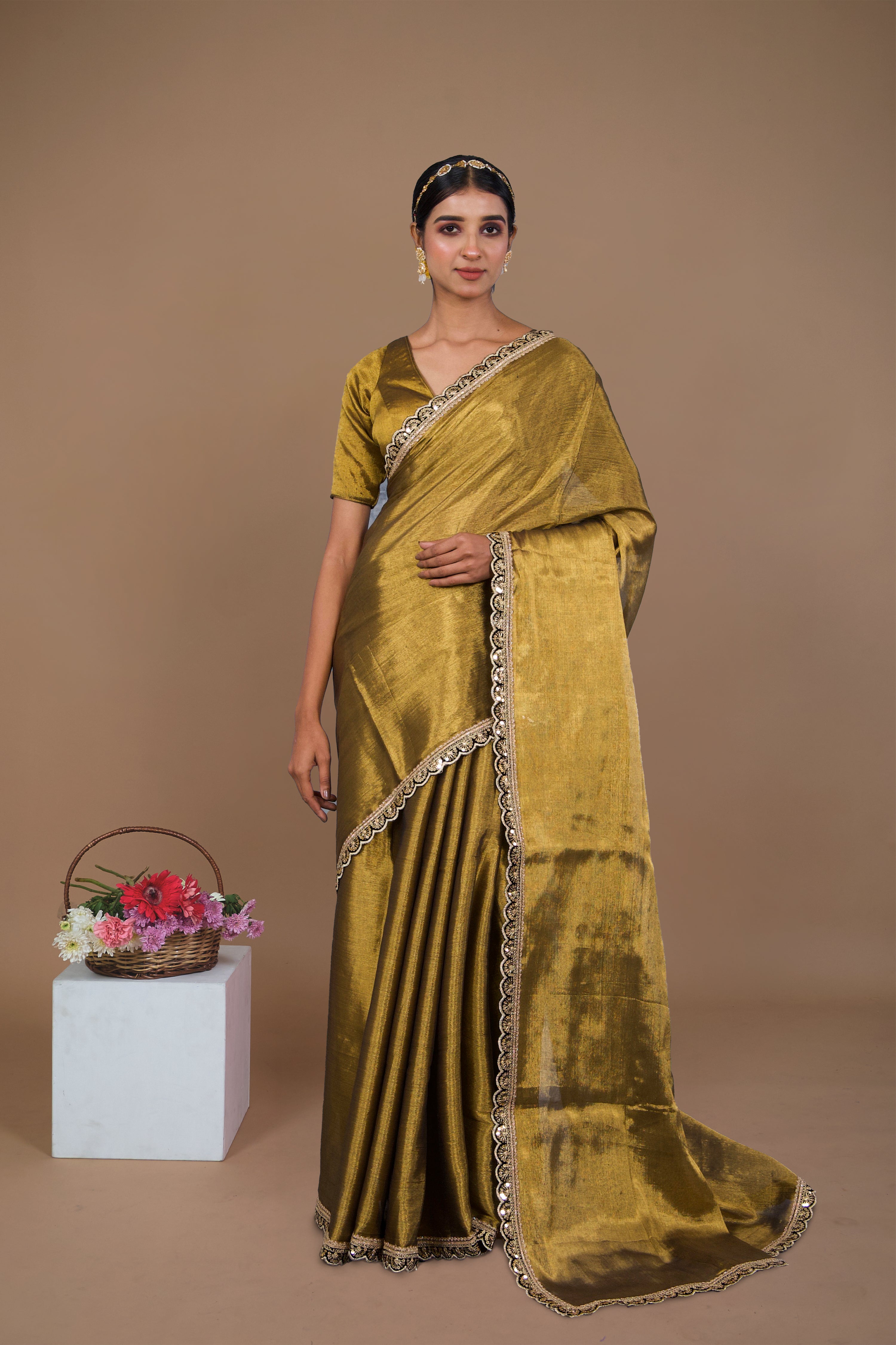 Swarangi I Golden handwoven tissue saree with black scalloped lace