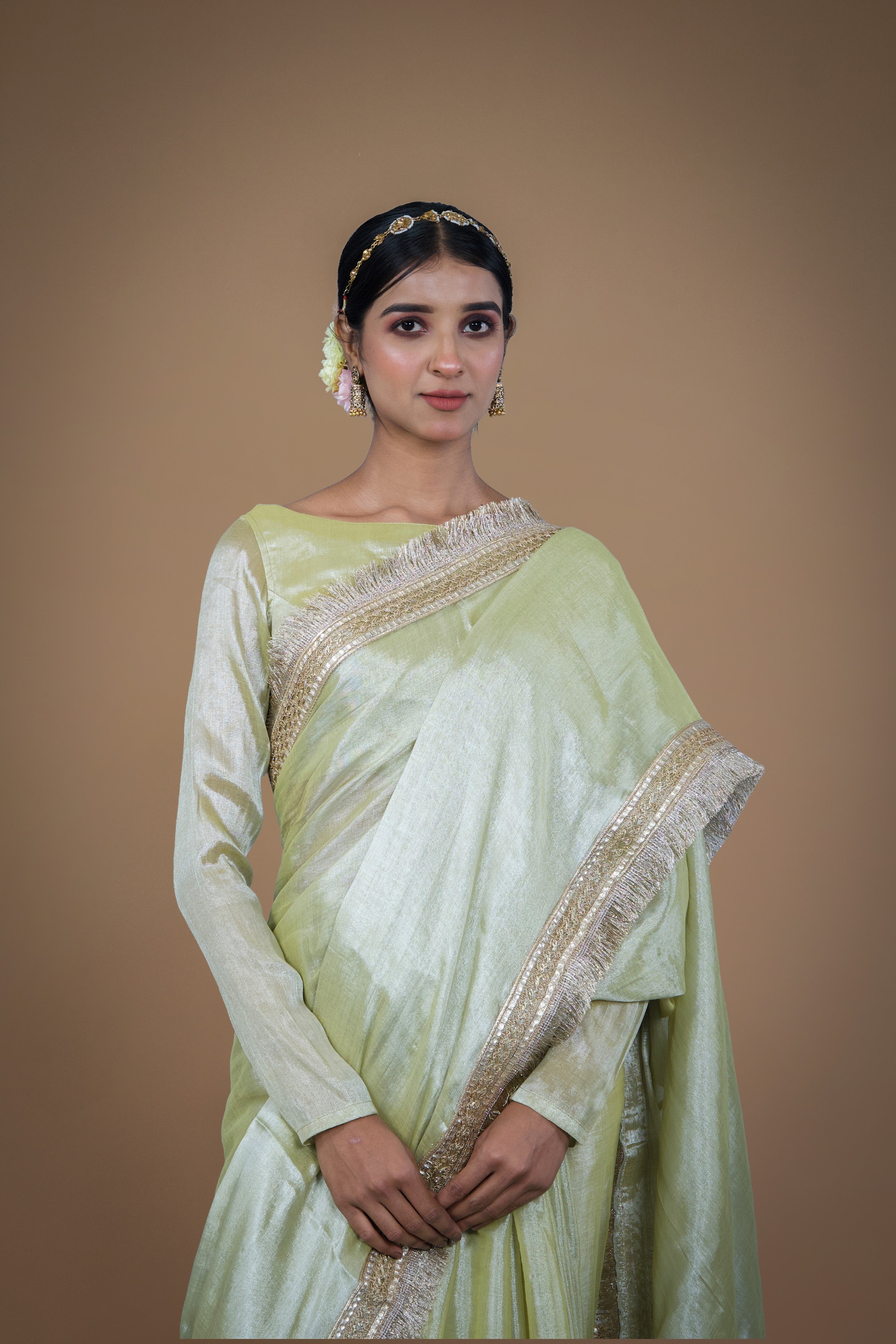 Sampada I Neon Olive handwoven tissue saree with matte gold lace