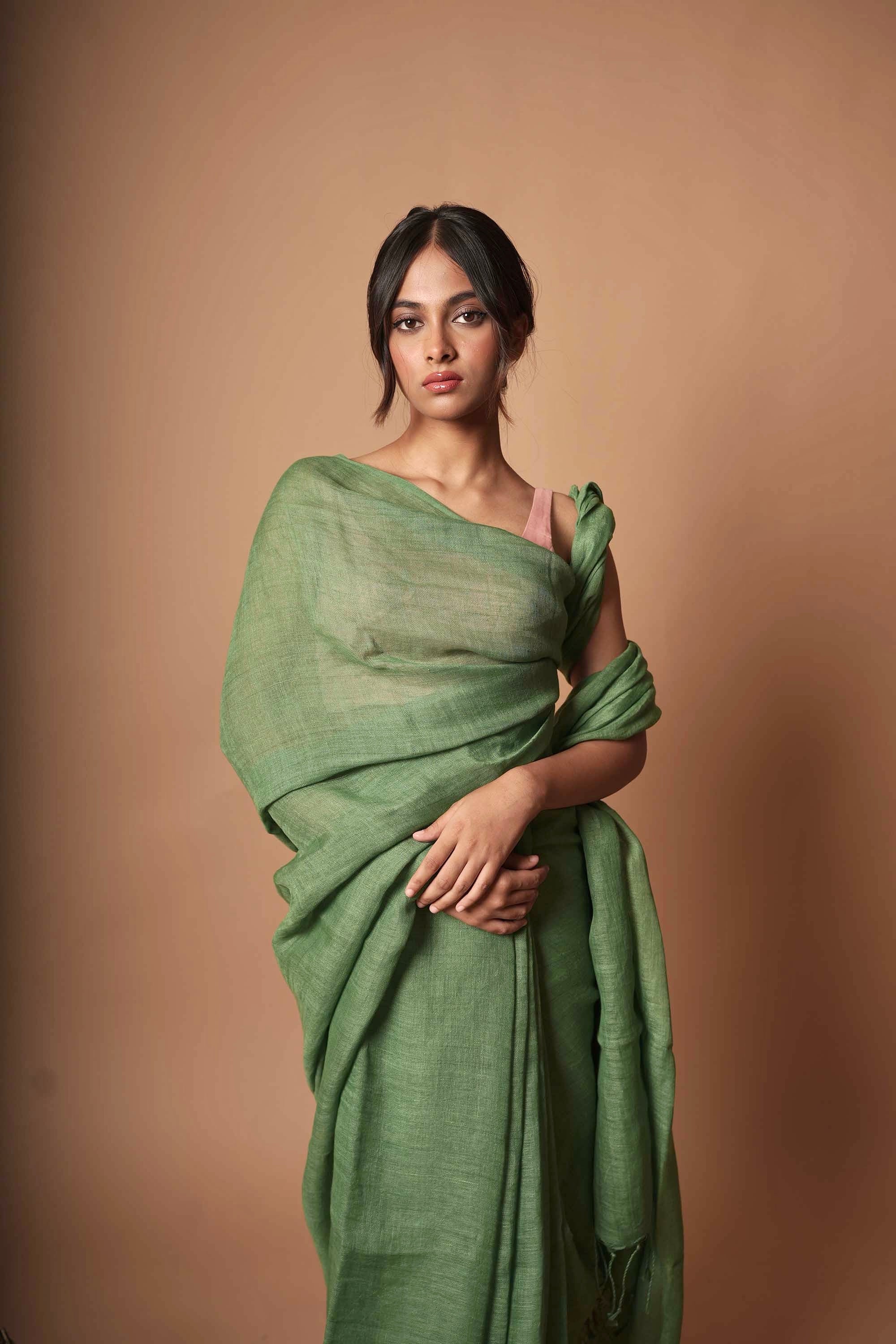 Rimjhim Saavan TLR-182 I Green Handloom Linen Saree With Minimal Flaws