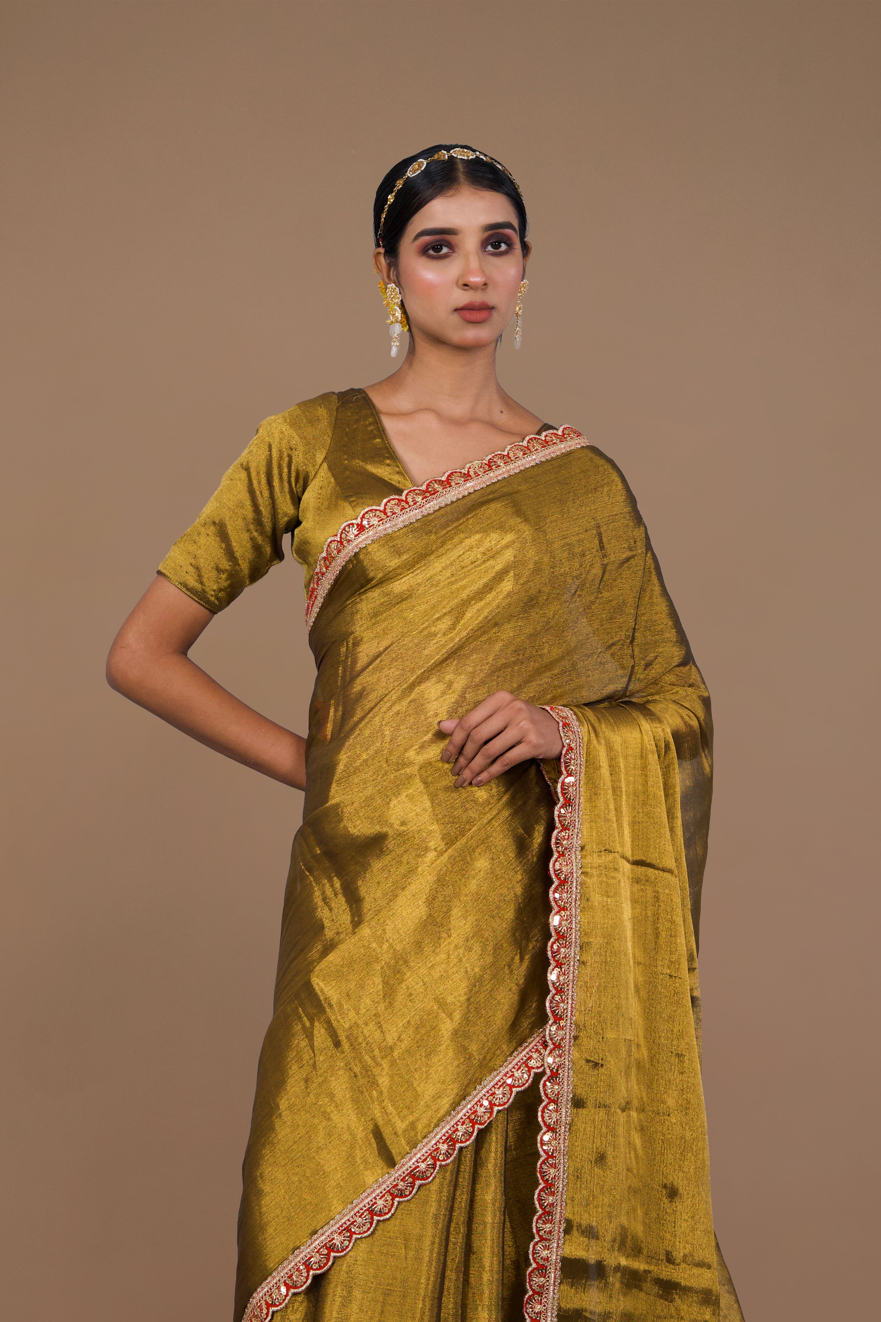 Swarnima I Golden handwoven tissue saree with red scalloped lace