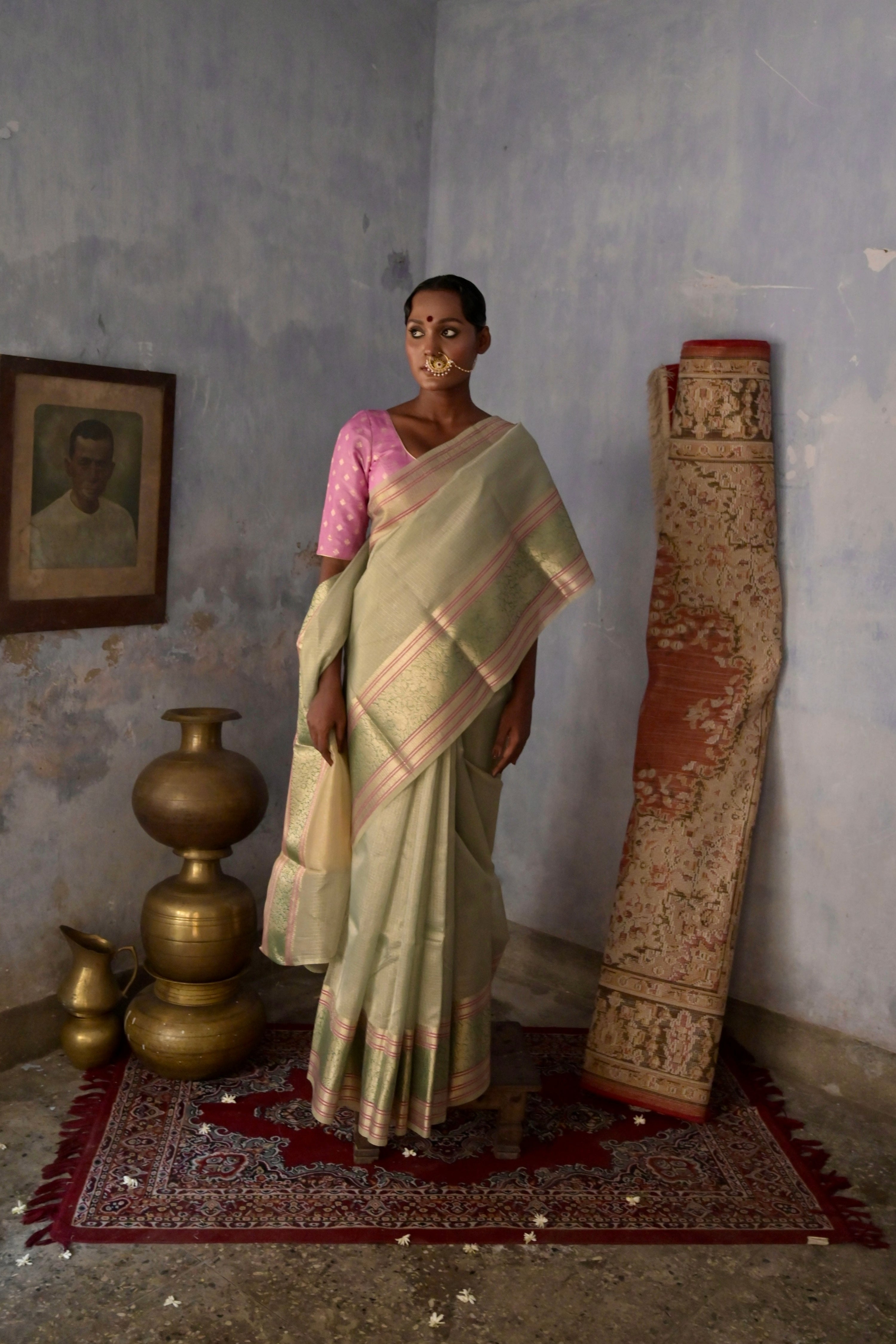 Anandi I Pastel Blue Handloom Kota Banarasi Saree with floral Zari Border