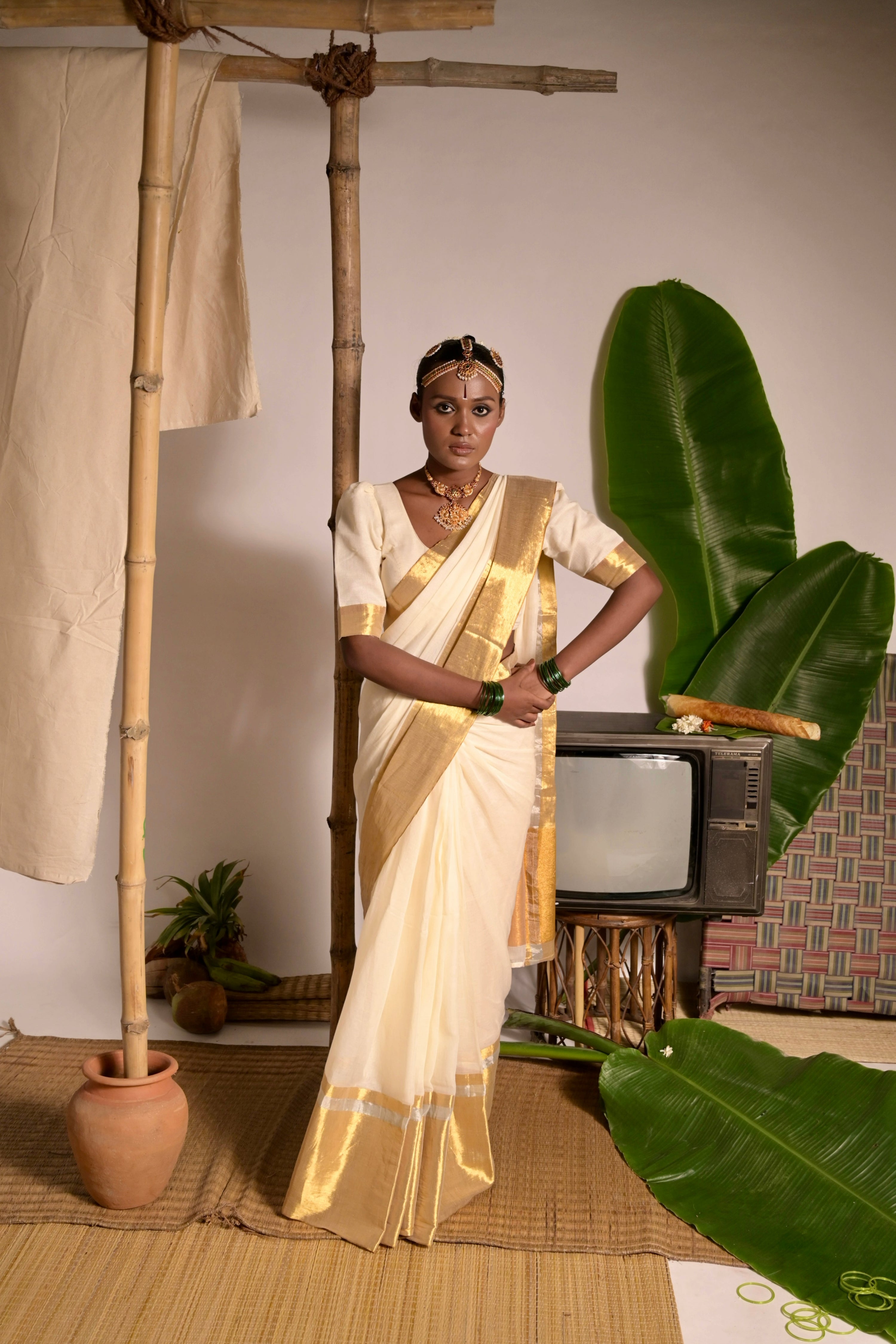 Swarnamaya I Off white mul cotton handwoven saree with golden border