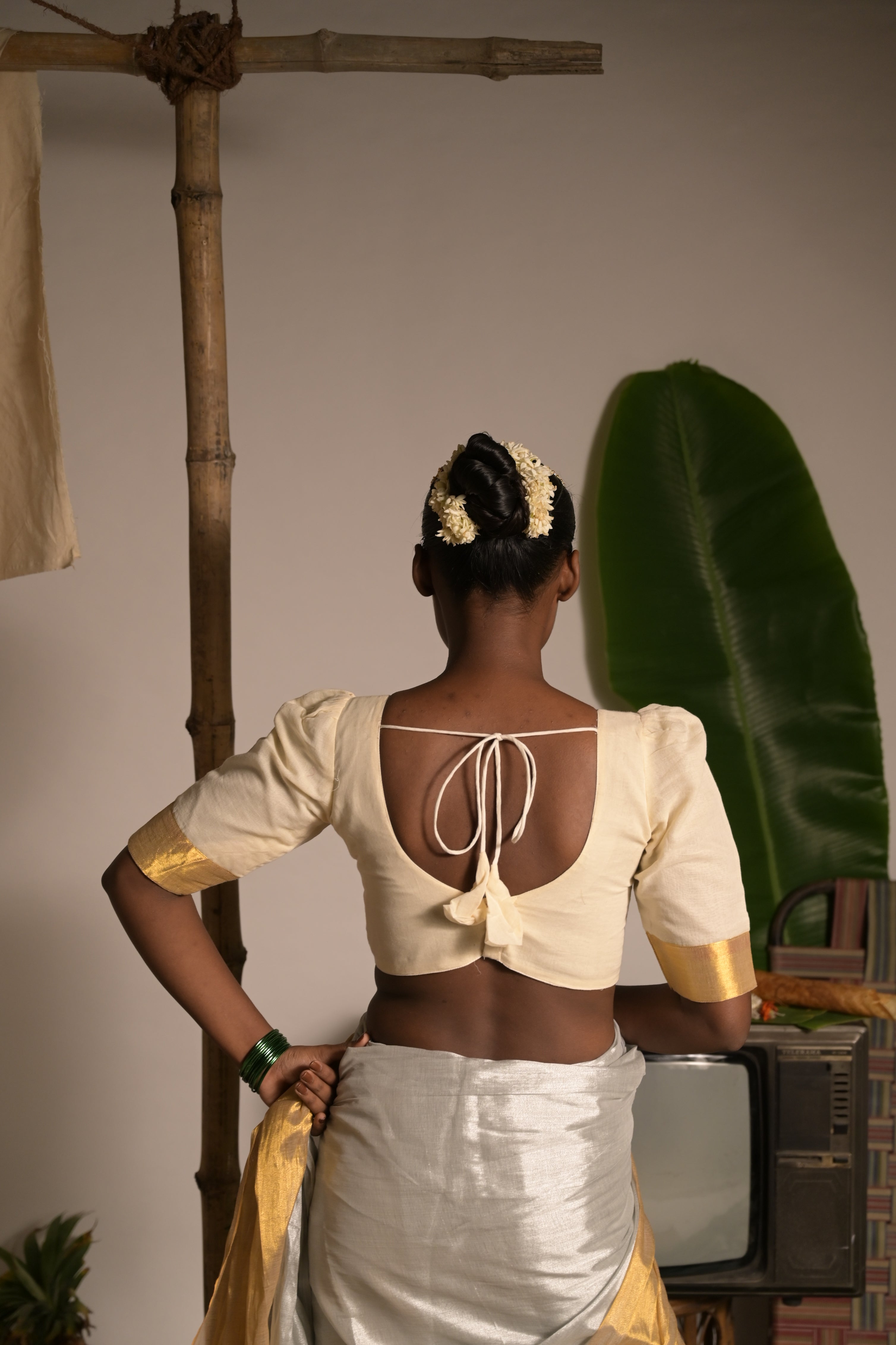 Shubhralekha I Off white cotton blouse with golden border on sleeves