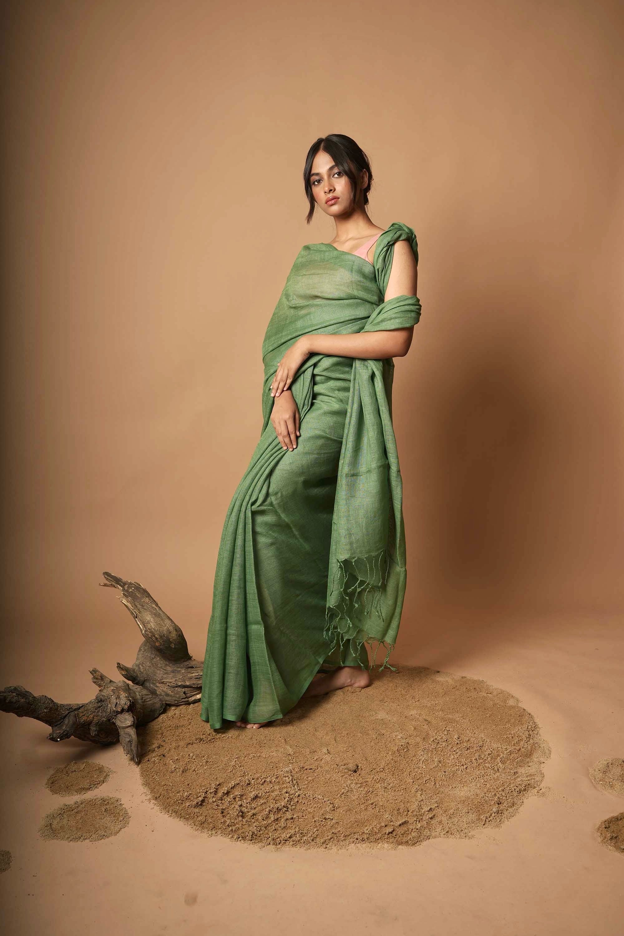 Rimjhim Saavan TLR-182 I Green Handloom Linen Saree With Minimal Flaws