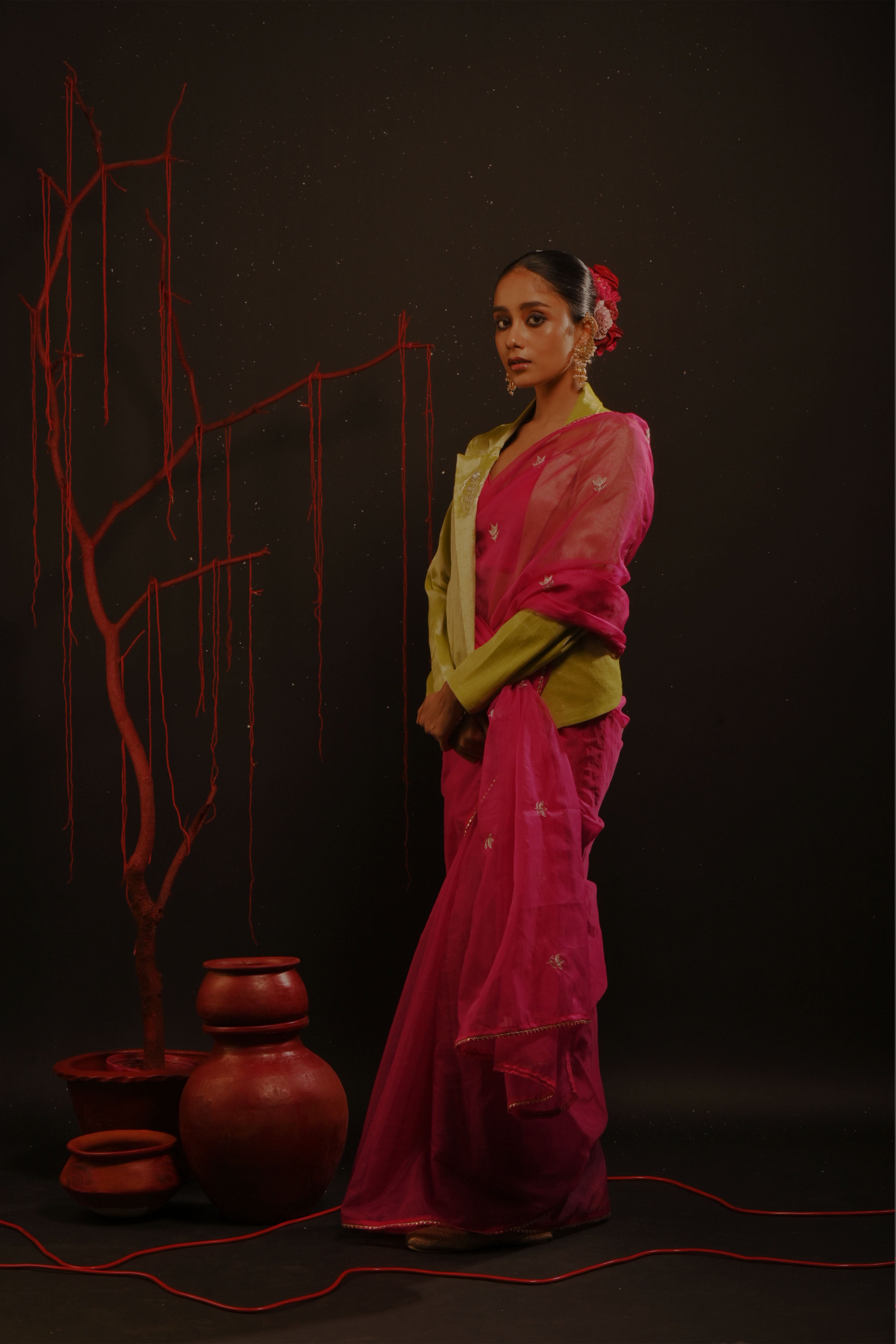 Gulmira I Fuchsia pink organza saree paired with pink chinon blouse and Tissue jacket