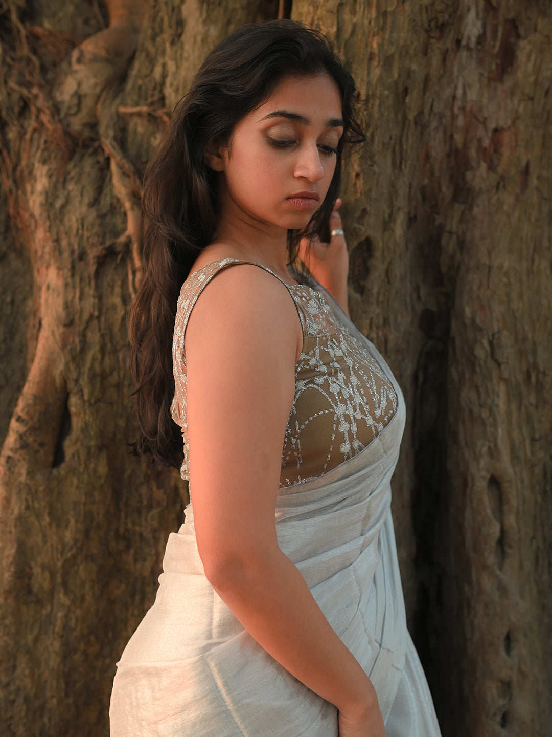 beige-sleeveless-blouse