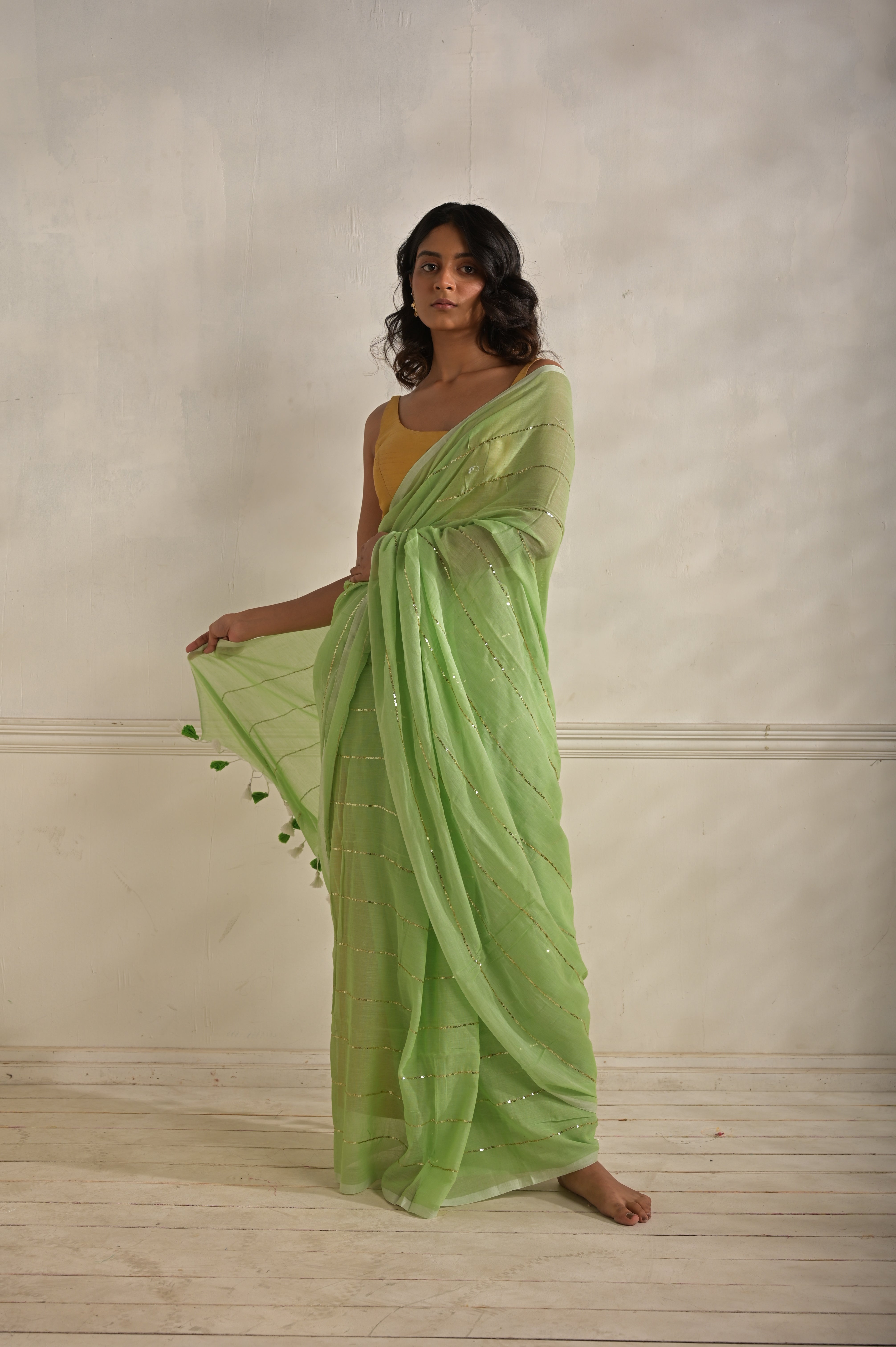 Miraya I Mint Green Handloom Mul Cotton saree with sequined lines