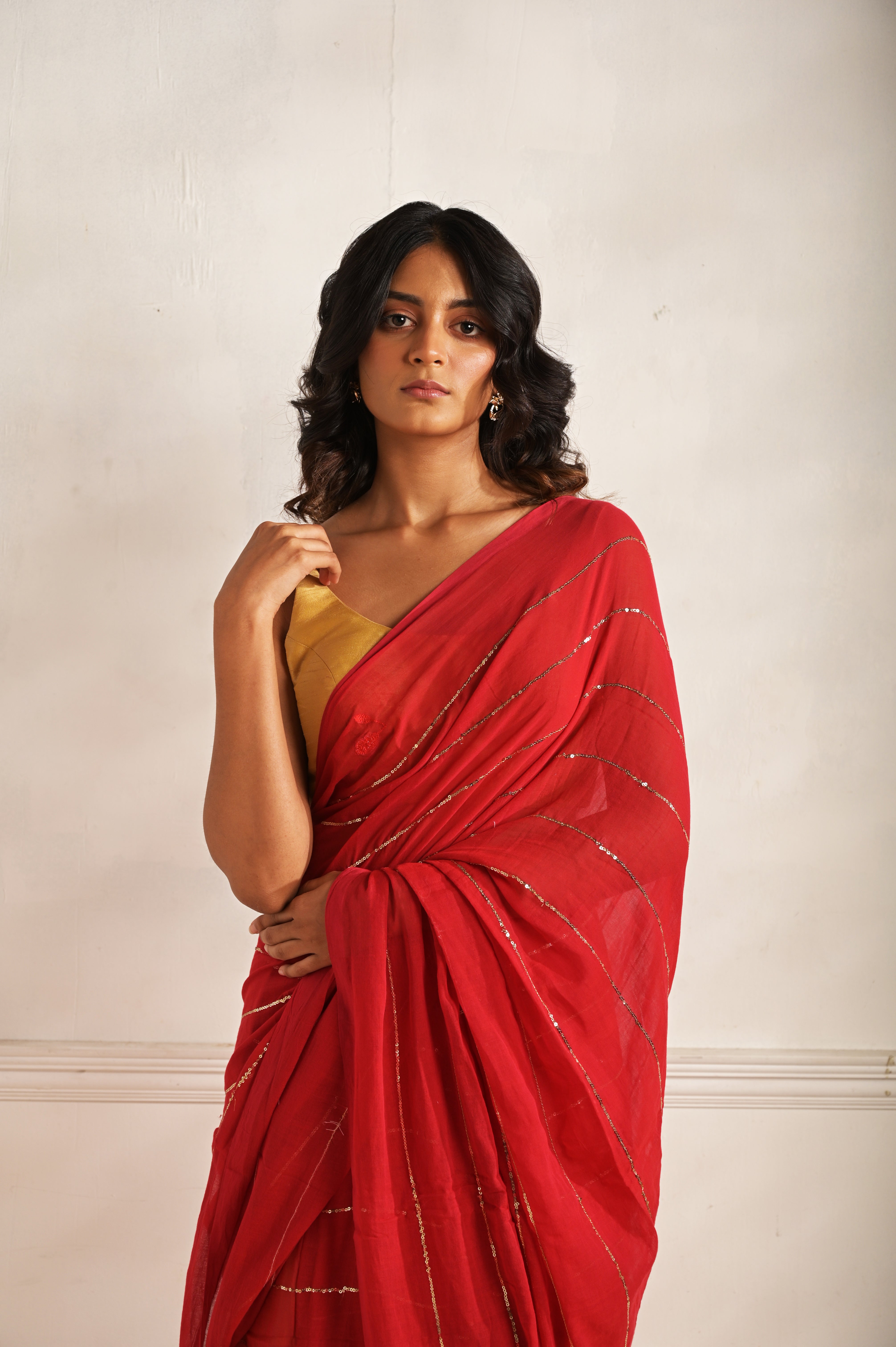 Dilruba I Red handloom mul cotton saree with sequined lines