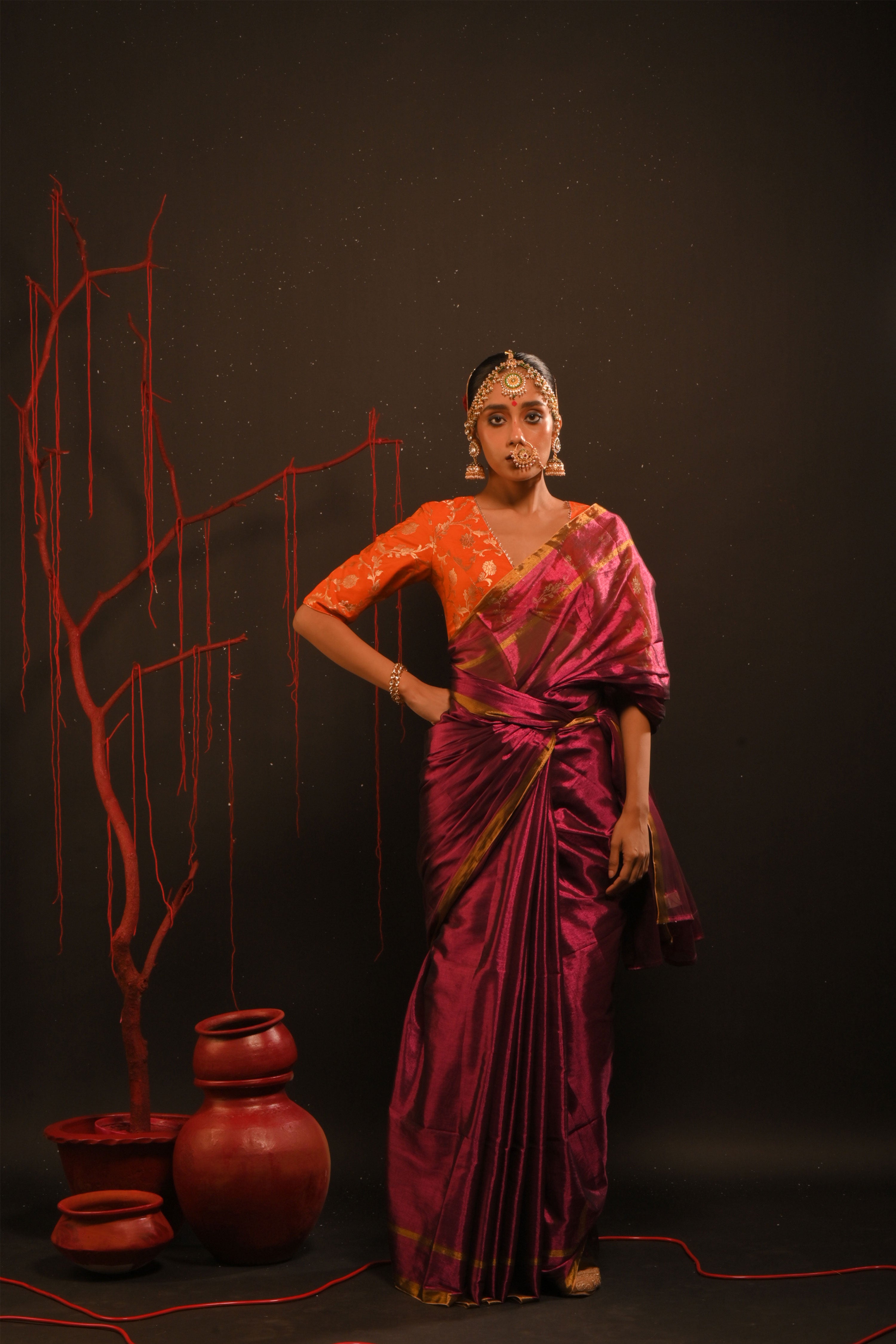 Suchitra I Pink handwoven tissue saree with gold striped border
