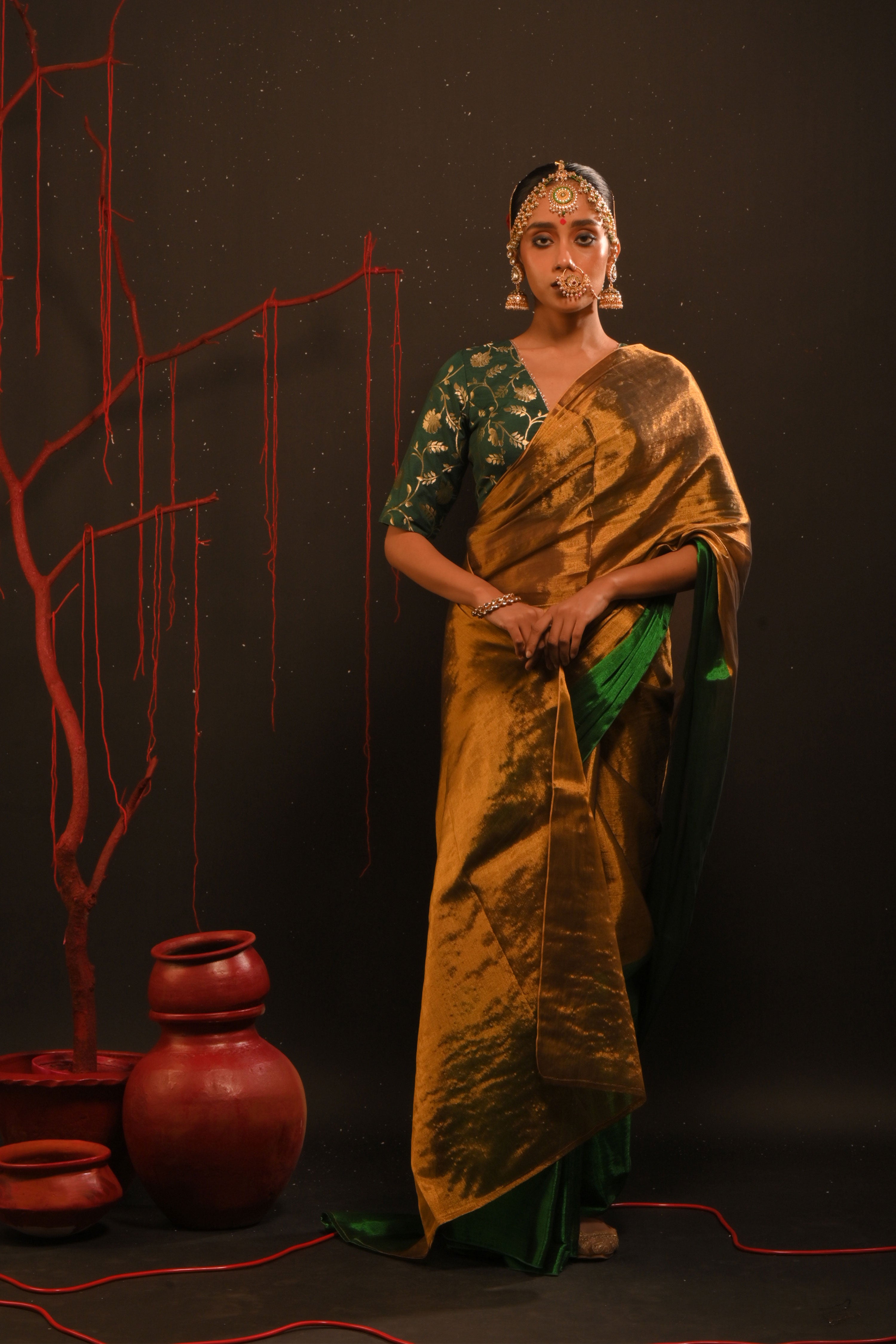 Jaishree I Gold handwoven tissue saree with green border