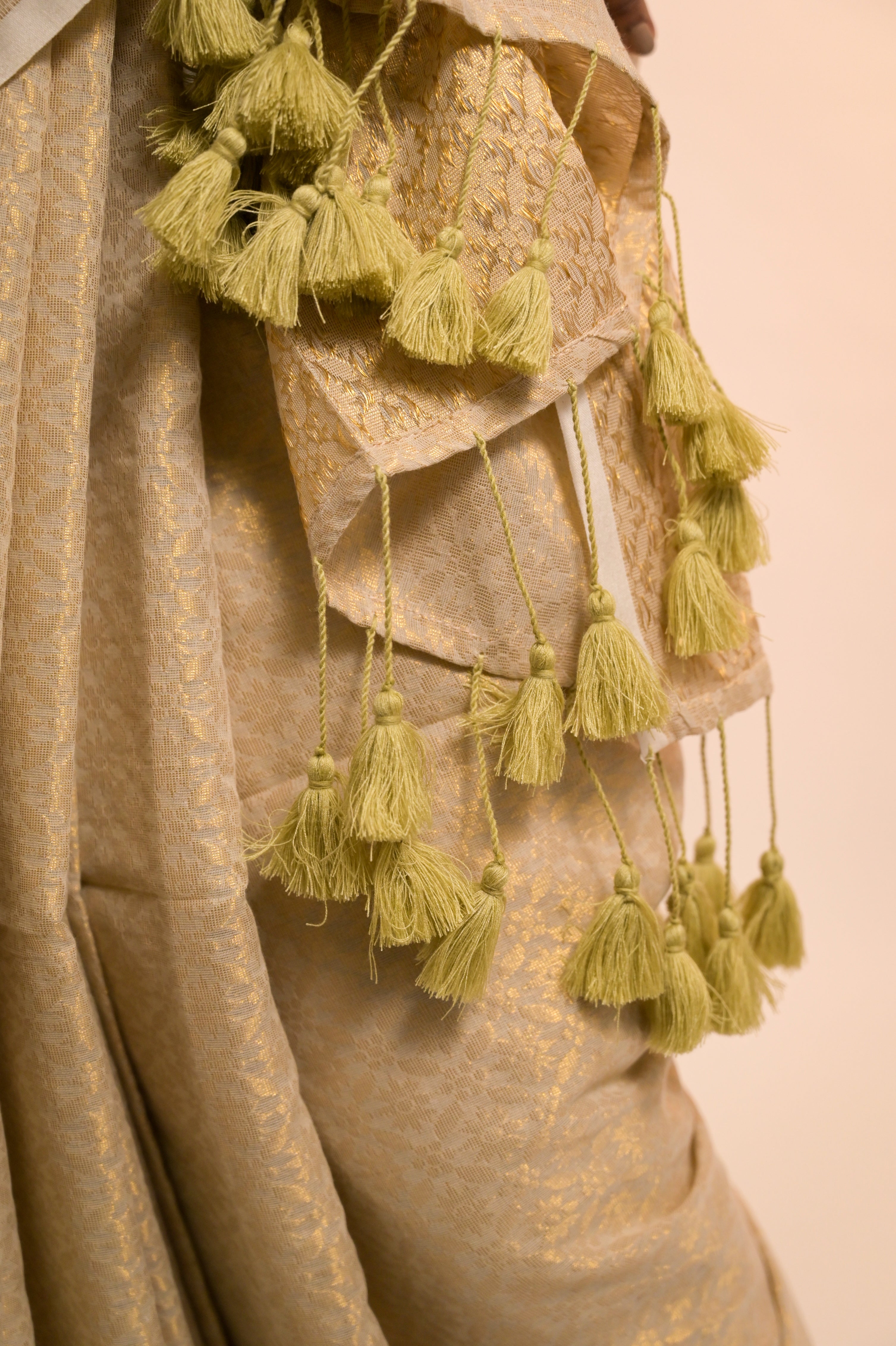 ivory-brocade-saree-with-tassels