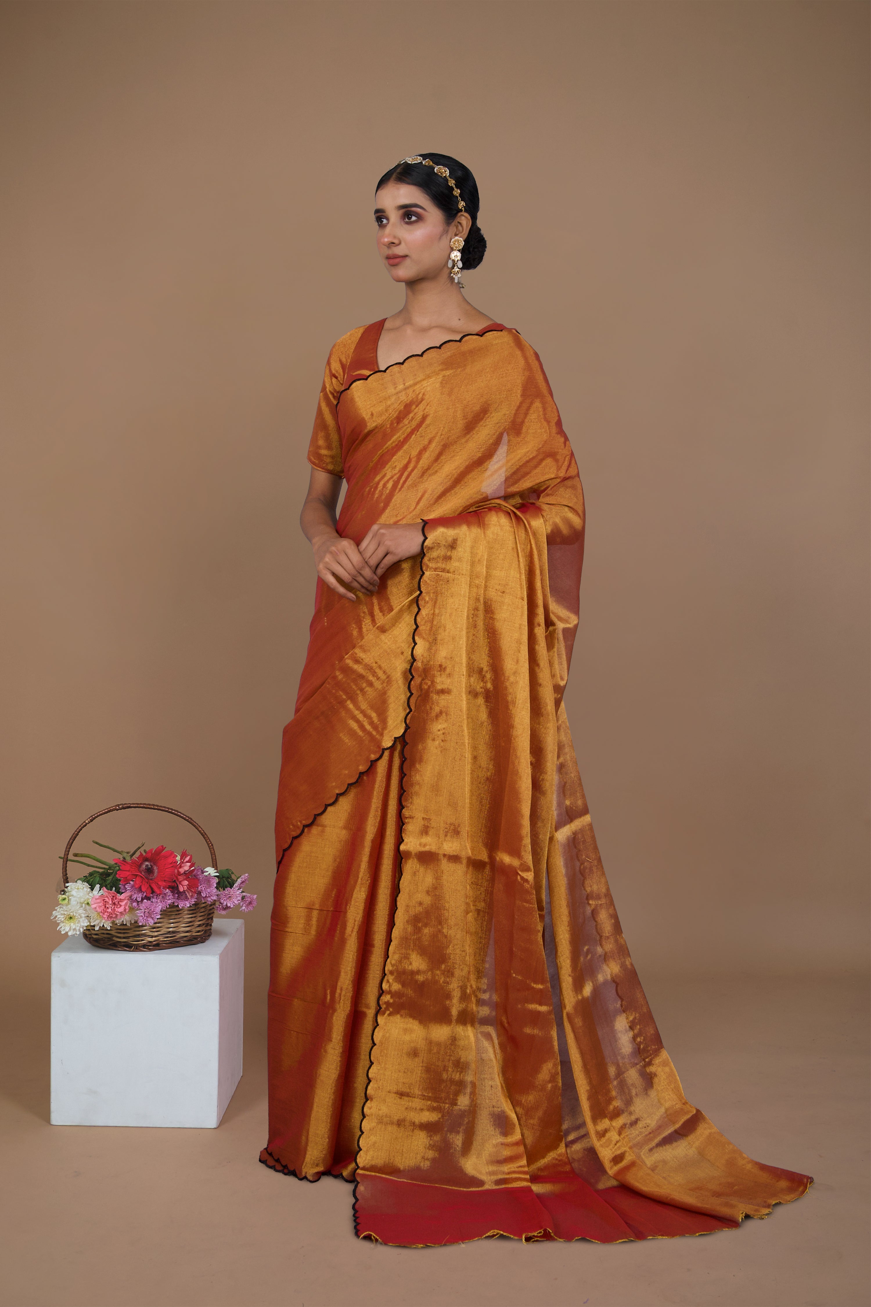 Lalitya I Rust gold handwoven tissue saree with scalloped pallu and border
