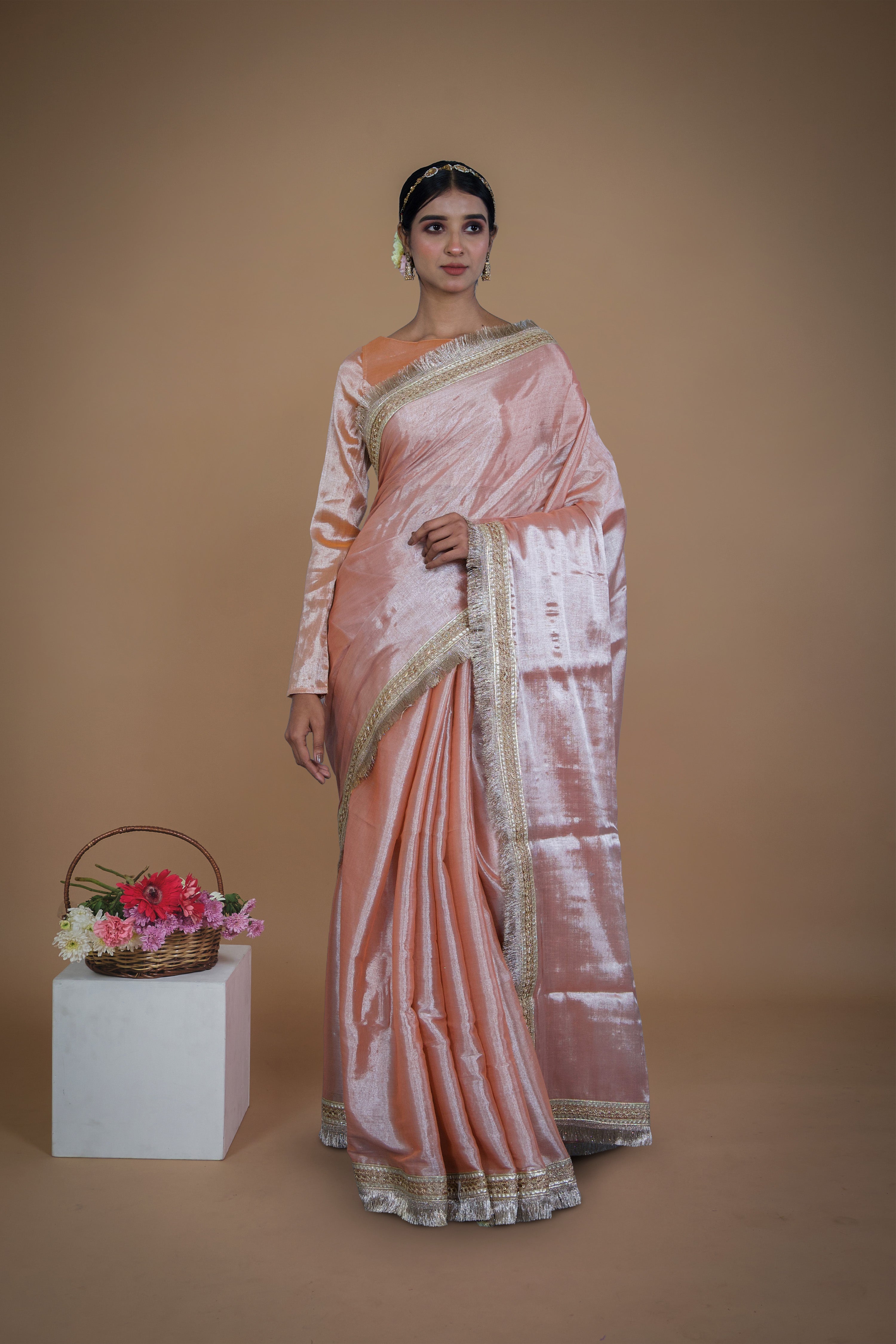 Suvarna I Neon orange handwoven tissue saree with matte gold lace
