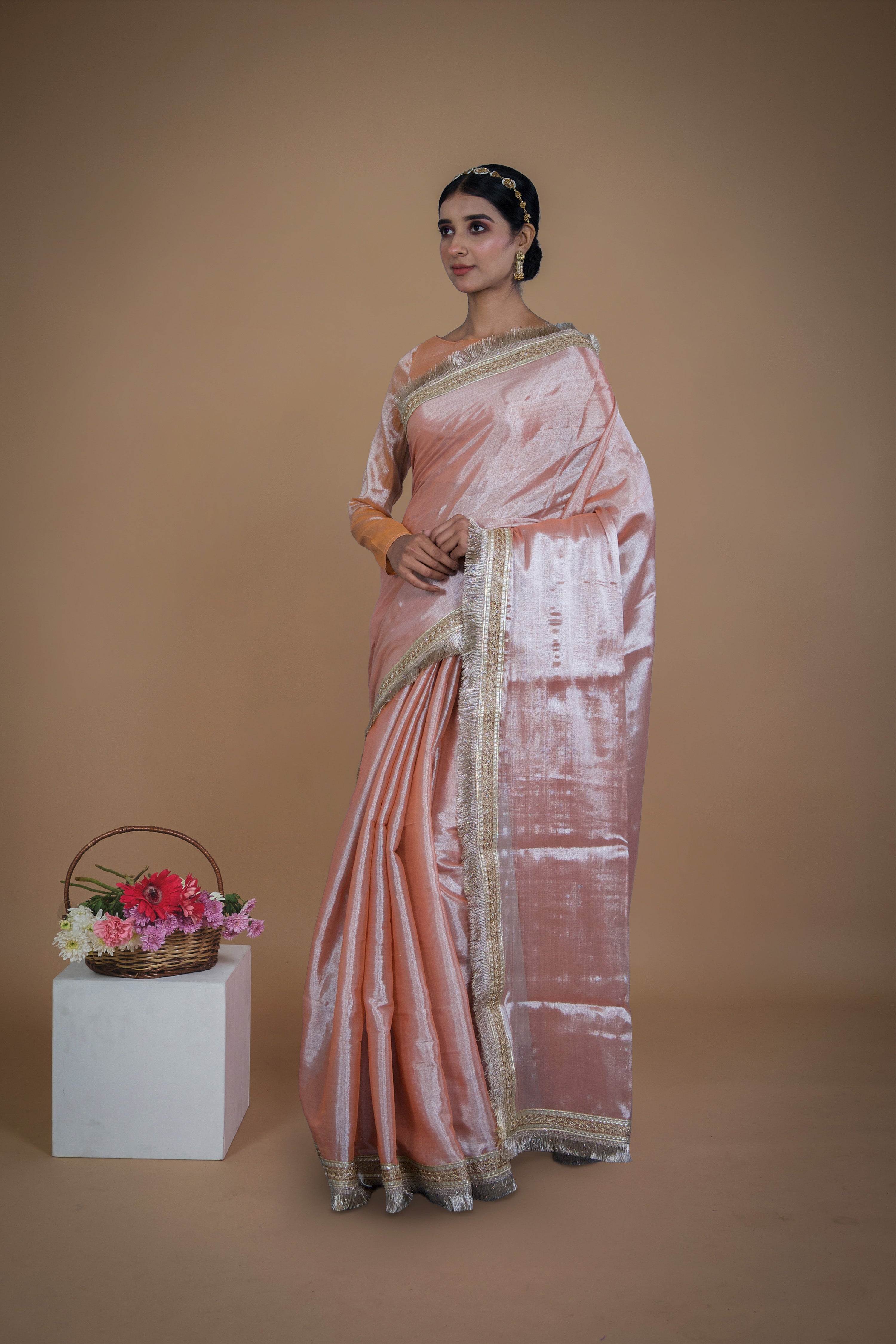 Suvarna I Neon orange handwoven tissue saree with matte gold lace