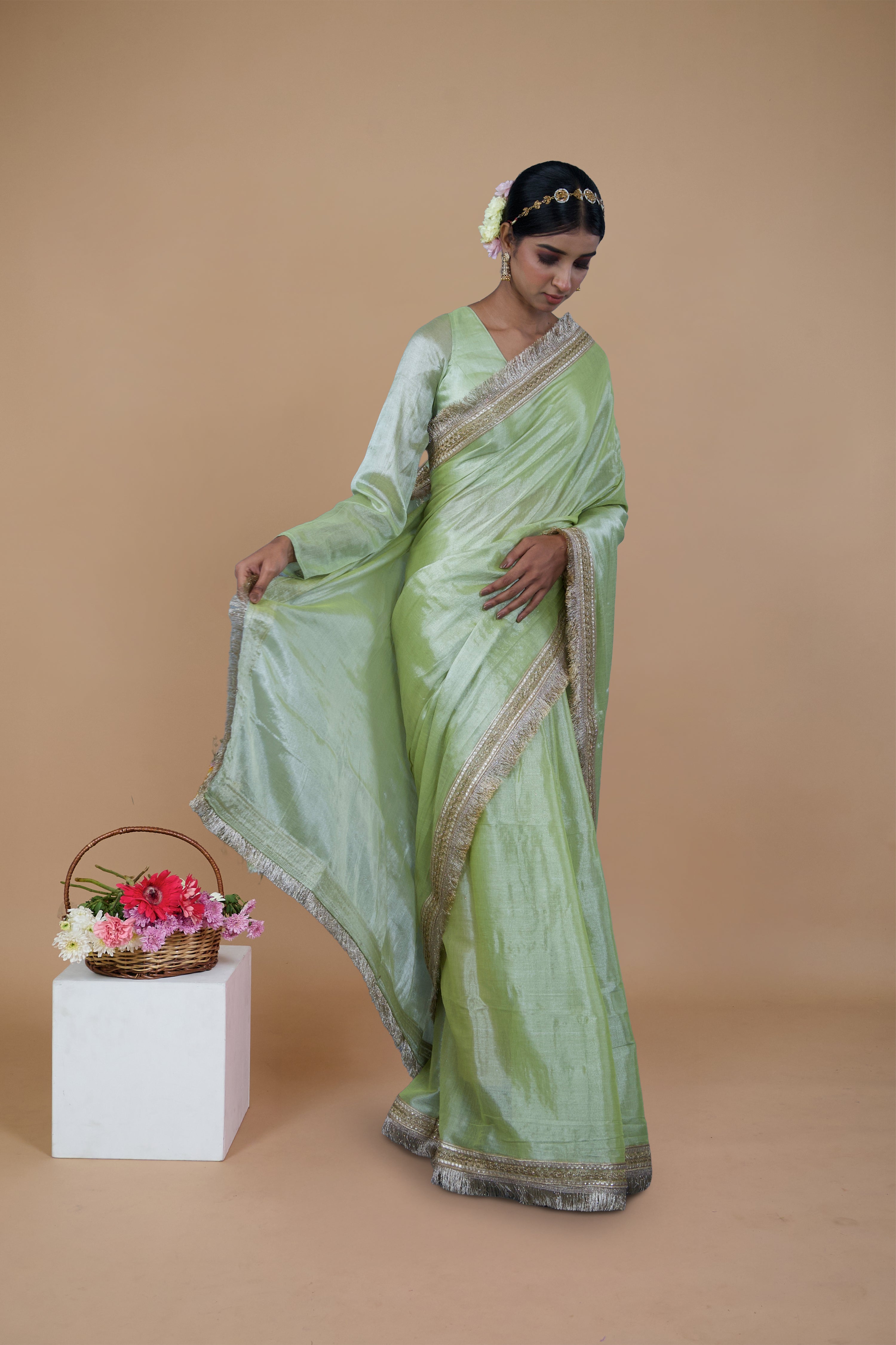 Mayukha I Neon Green handwoven tissue saree with matte gold lace