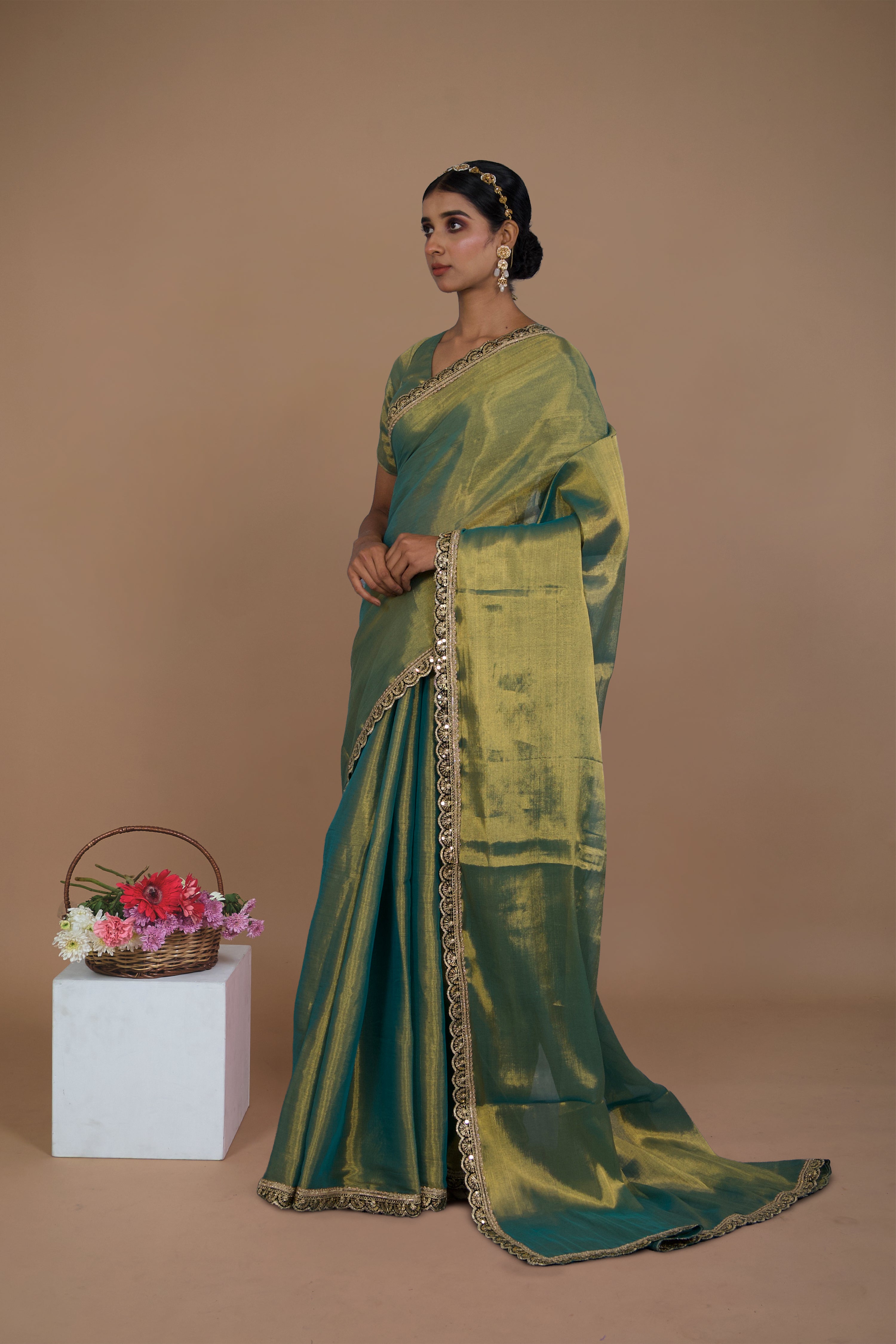 Ritika I Sea green handwoven tissue saree with scalloped lace