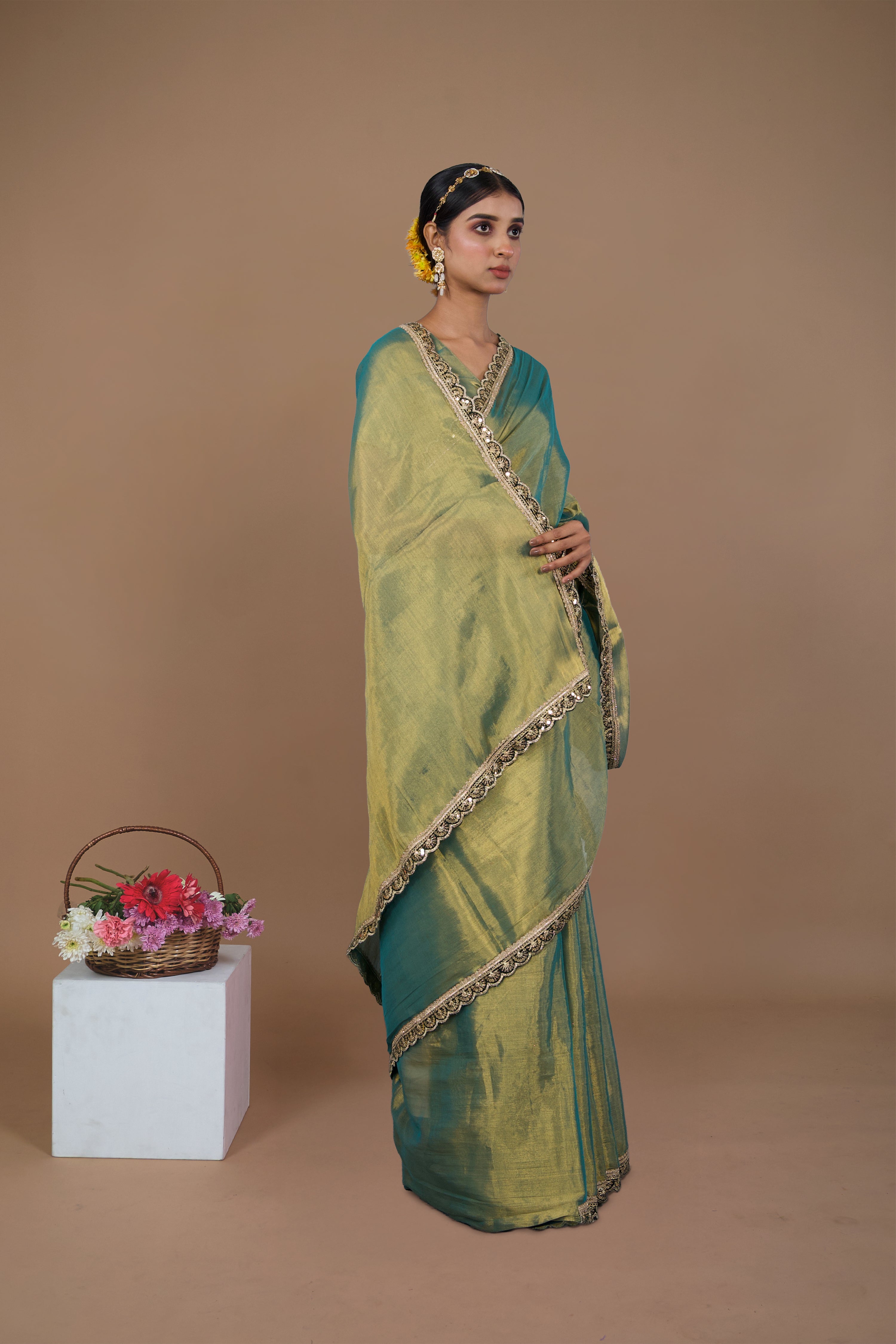 Ritika I Sea green handwoven tissue saree with scalloped lace