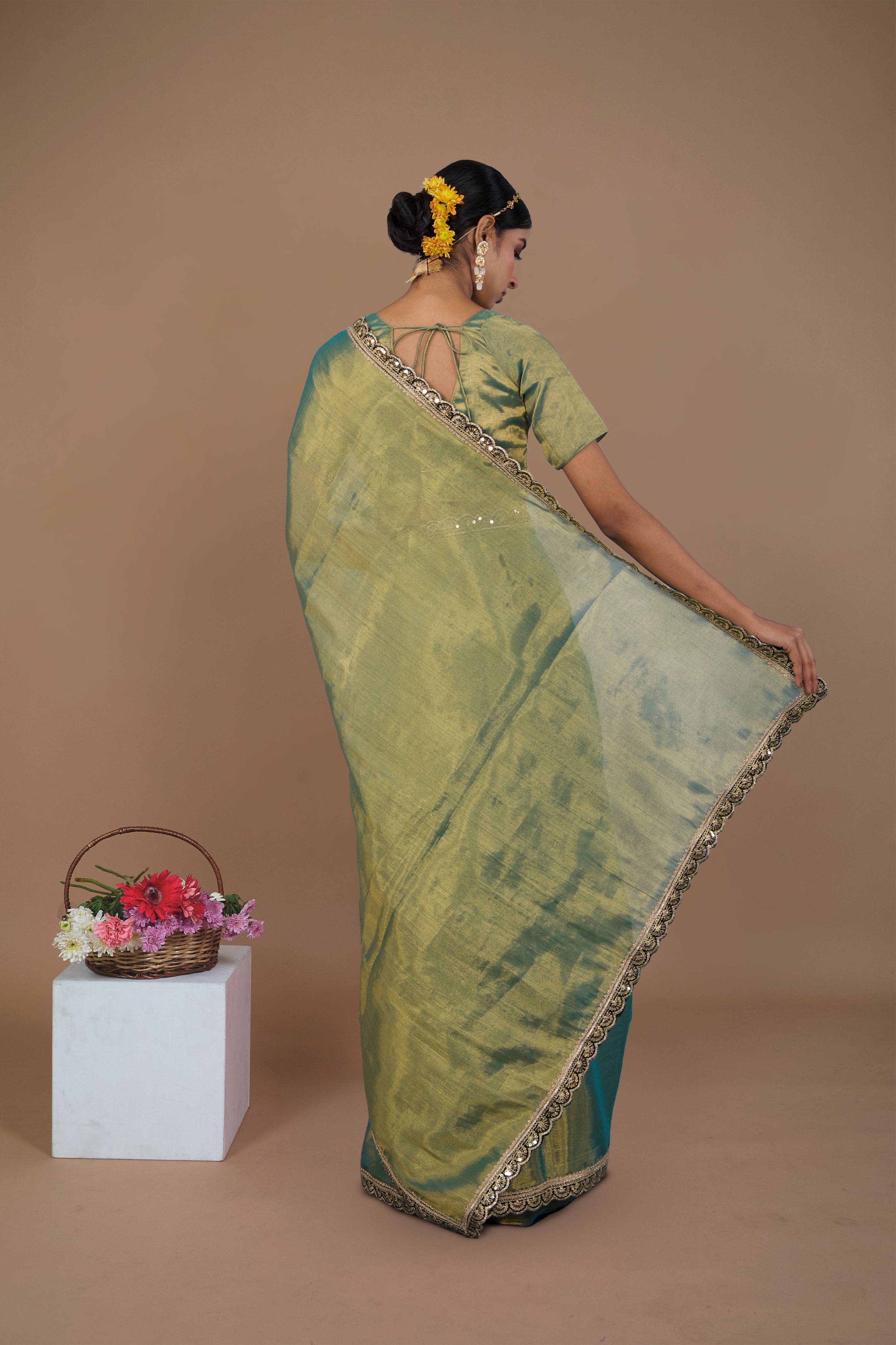 Ritika I Sea green handwoven tissue saree with scalloped lace