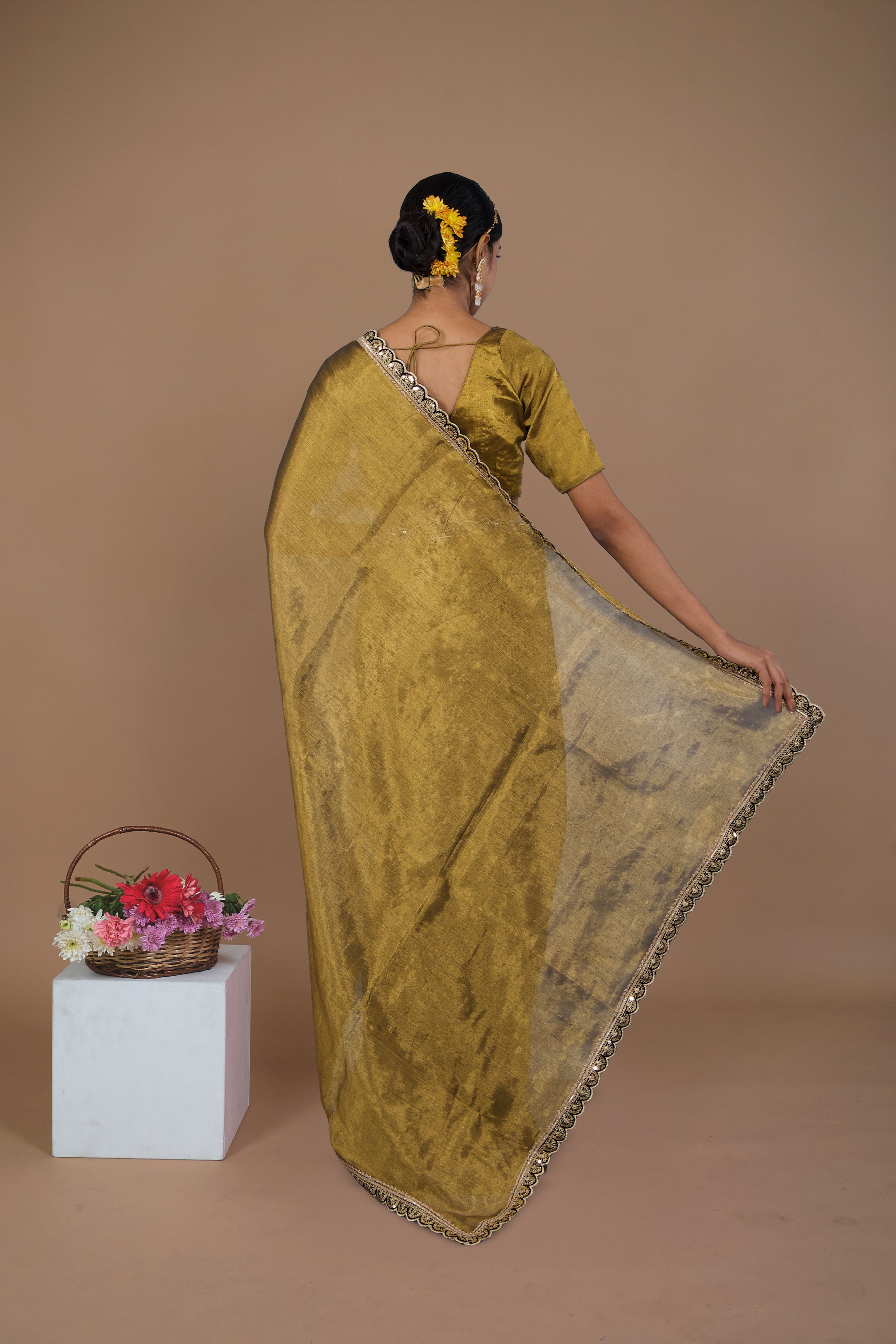 Swarangi I Golden handwoven tissue saree with black scalloped lace