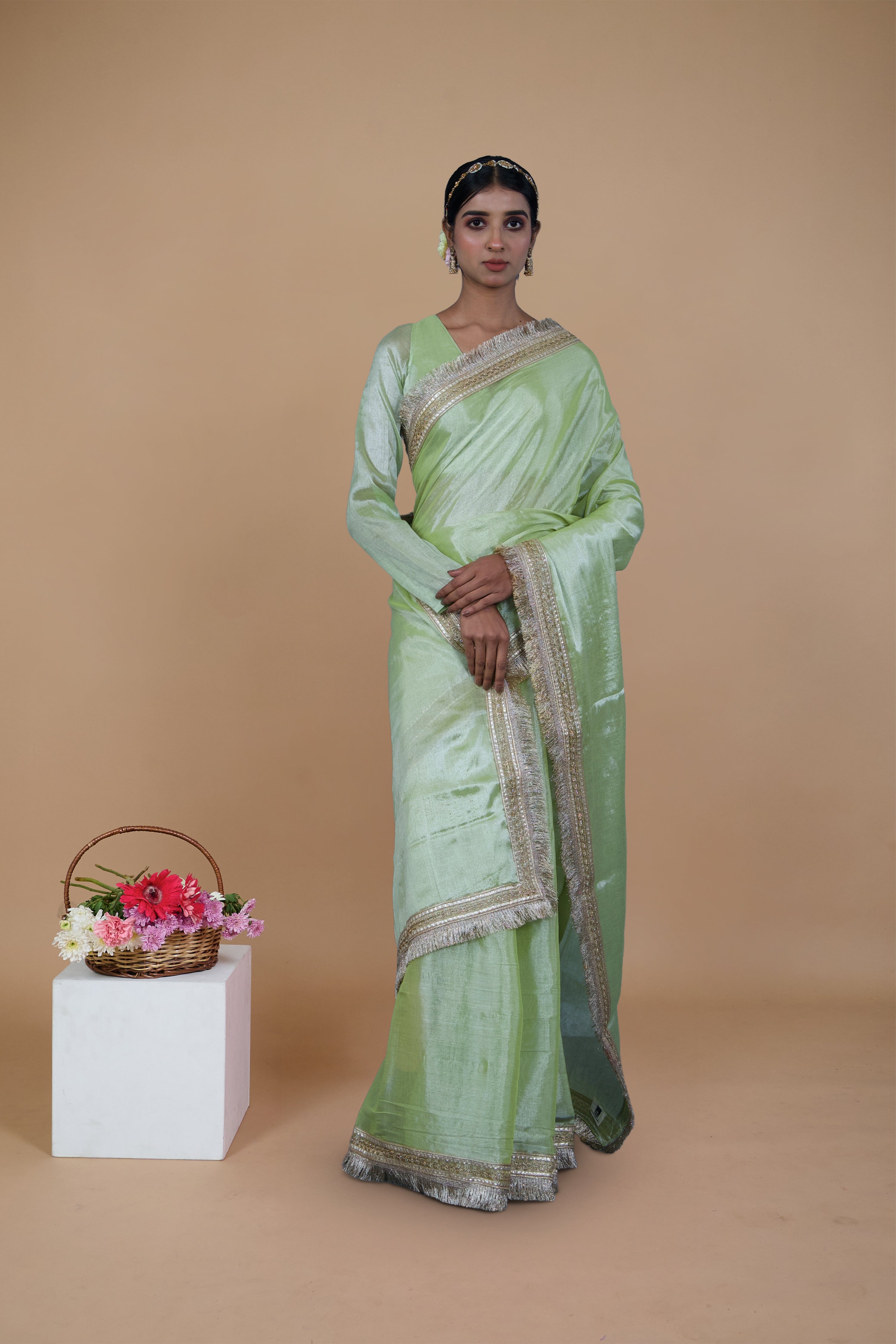 Mayukha I Neon Green handwoven tissue saree with matte gold lace