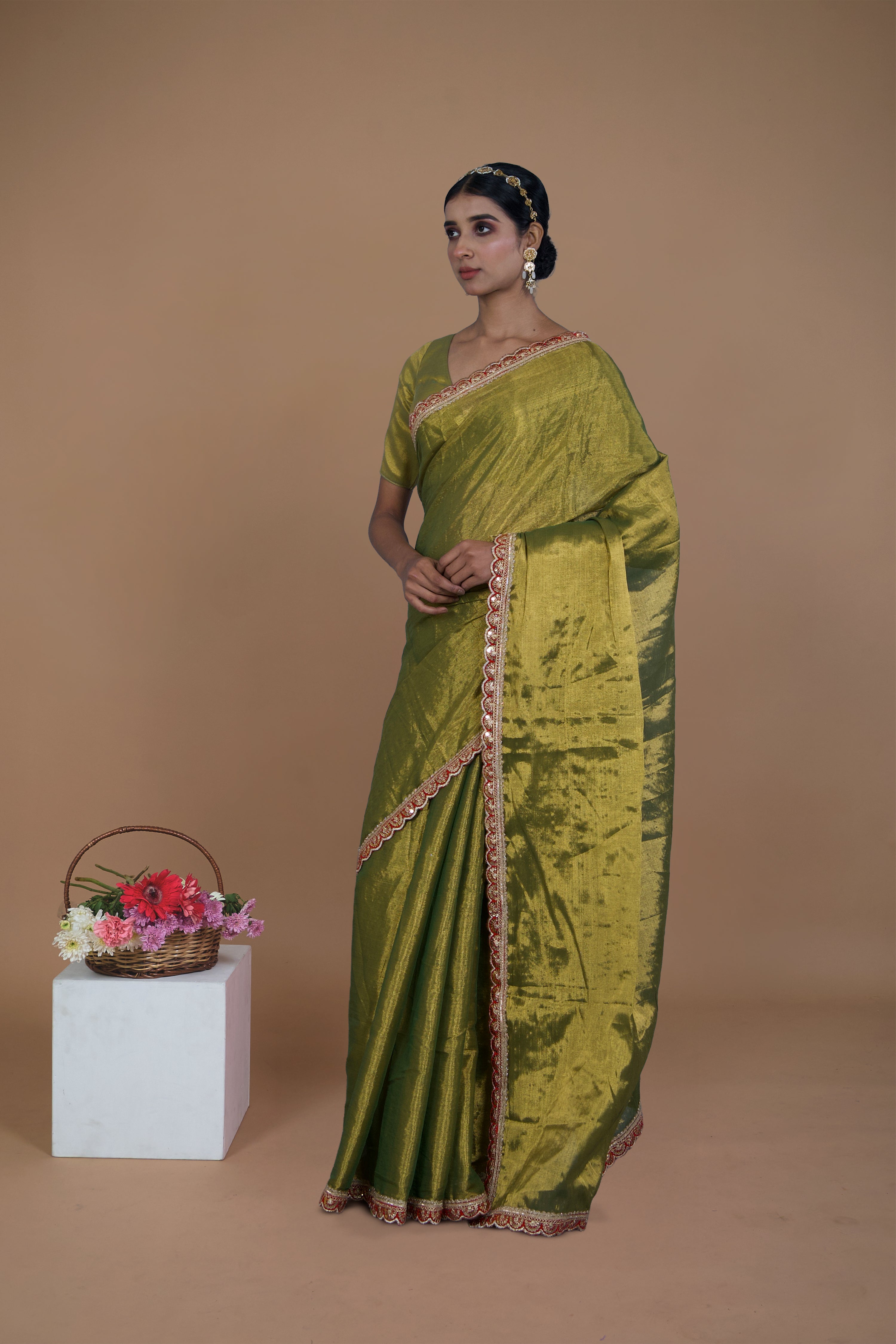 Yashvi I Olive Green handwoven tissue saree with scalloped lace