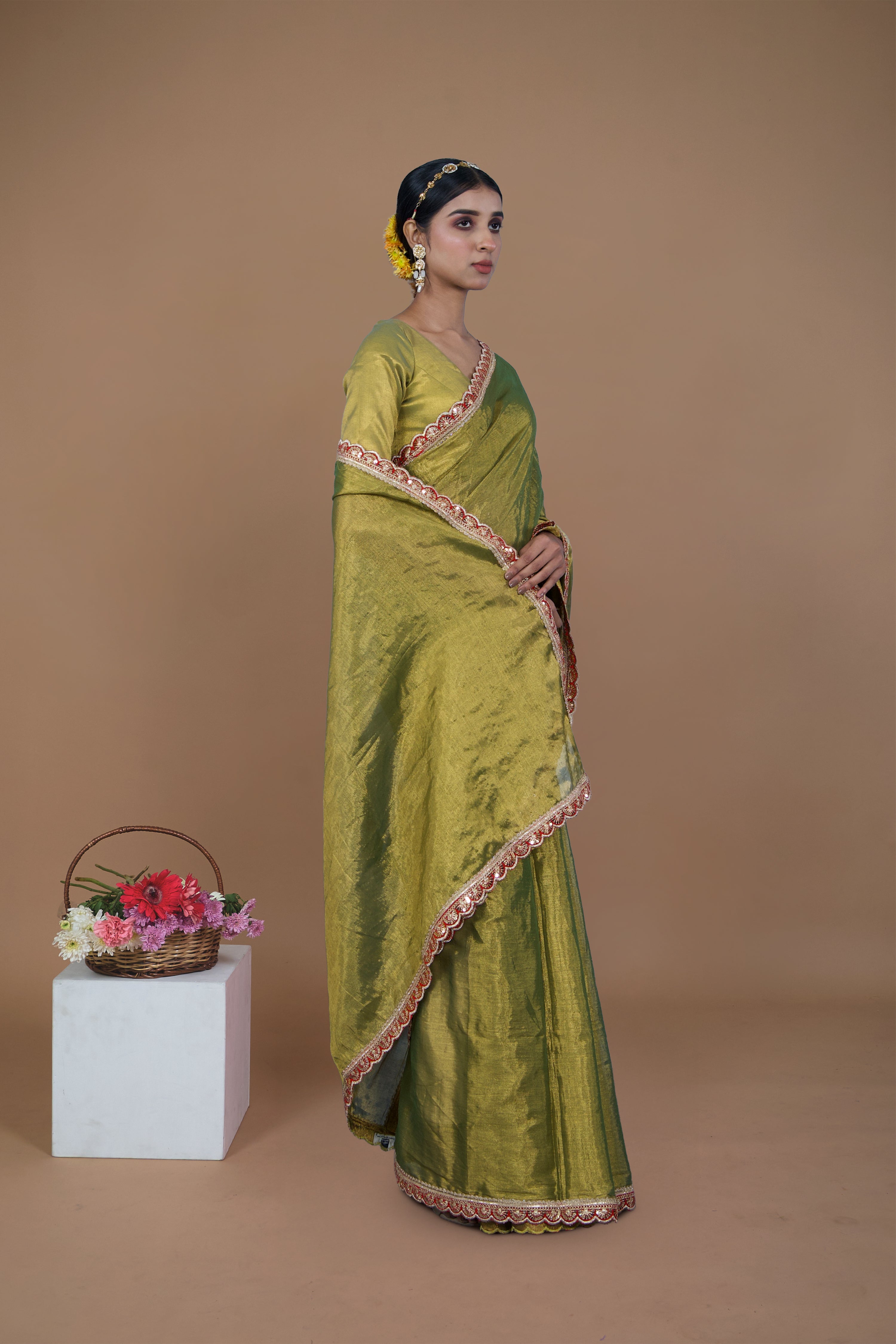 Yashvi I Olive Green handwoven tissue saree with scalloped lace