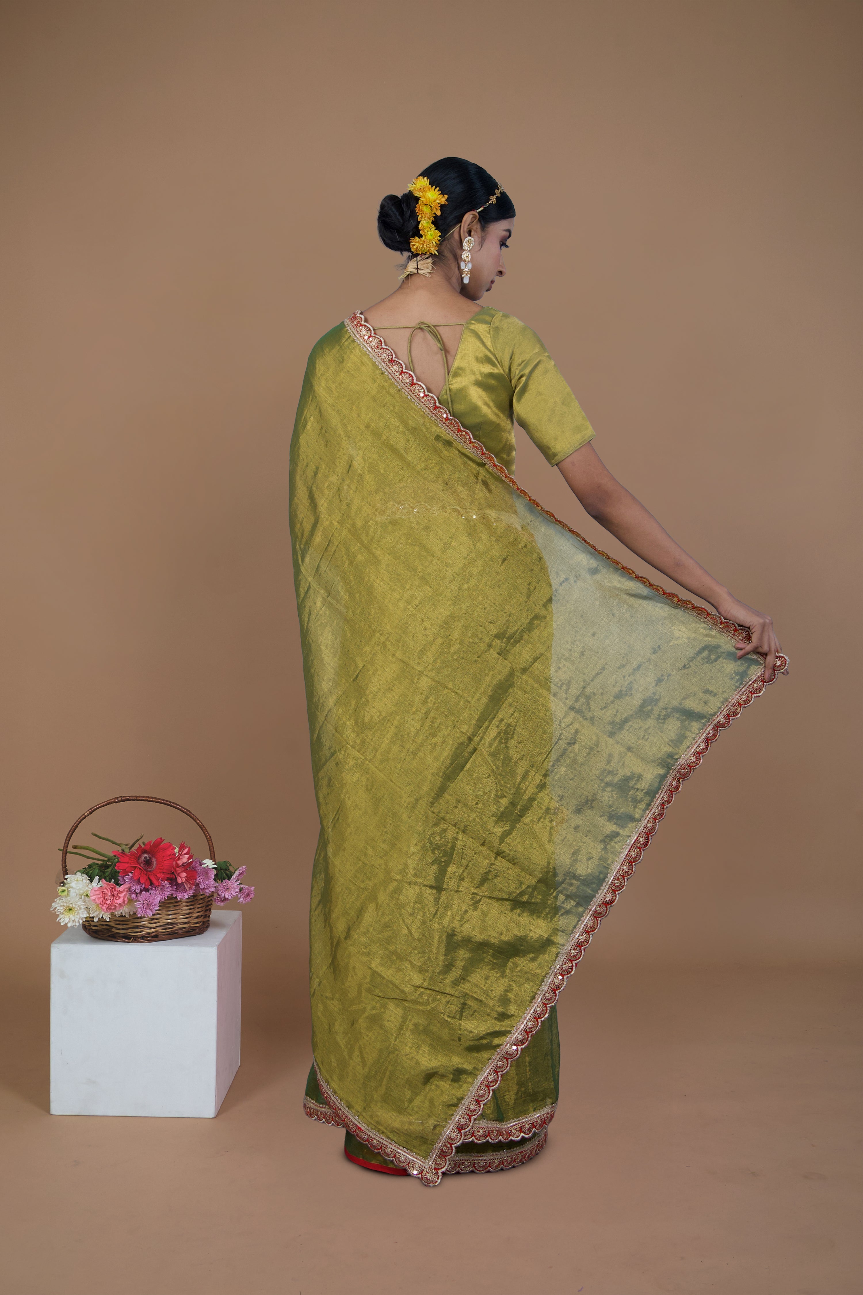 Yashvi I Olive Green handwoven tissue saree with scalloped lace