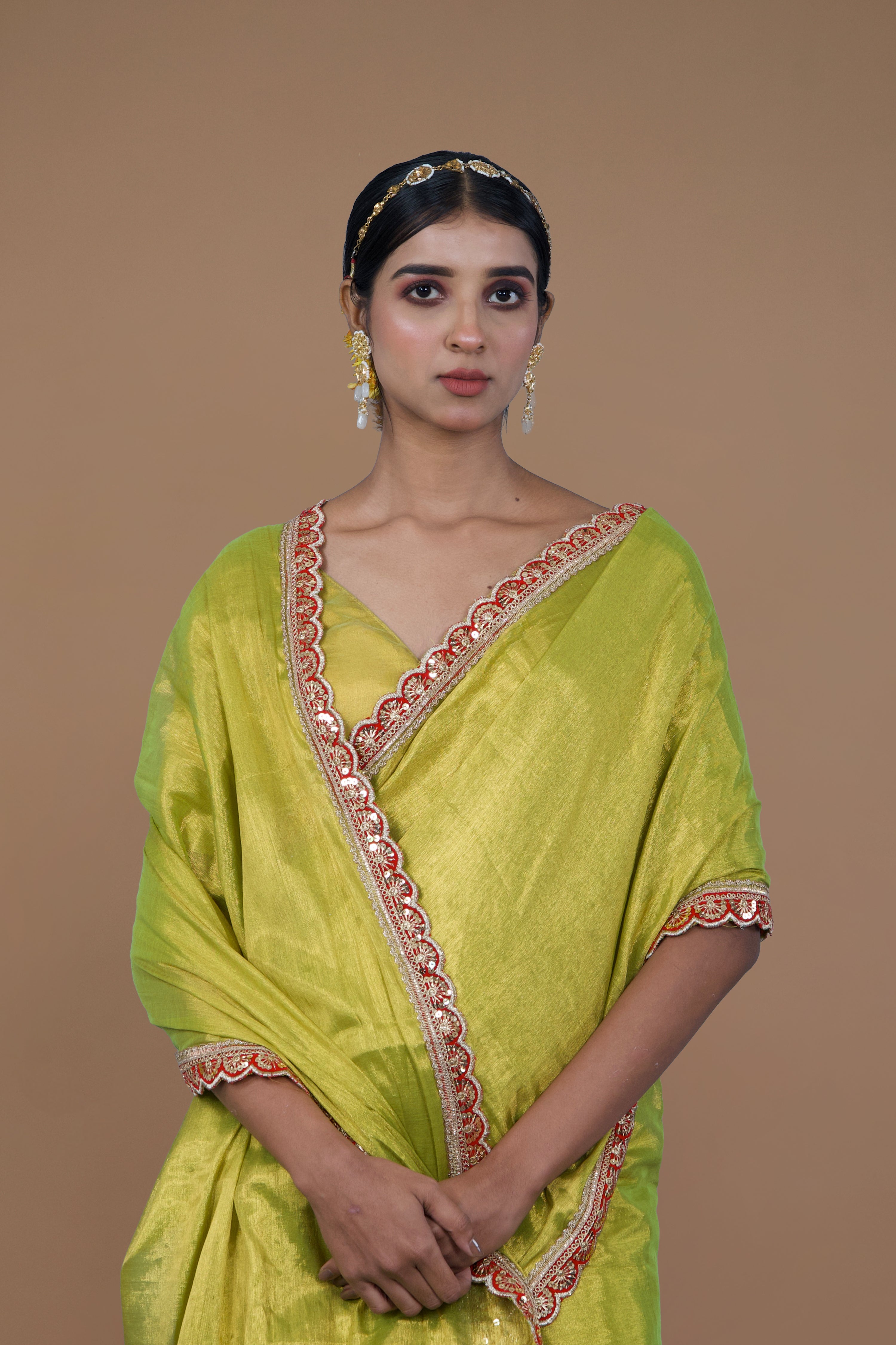 Nirali I Neon green handwoven tissue saree with scalloped lace