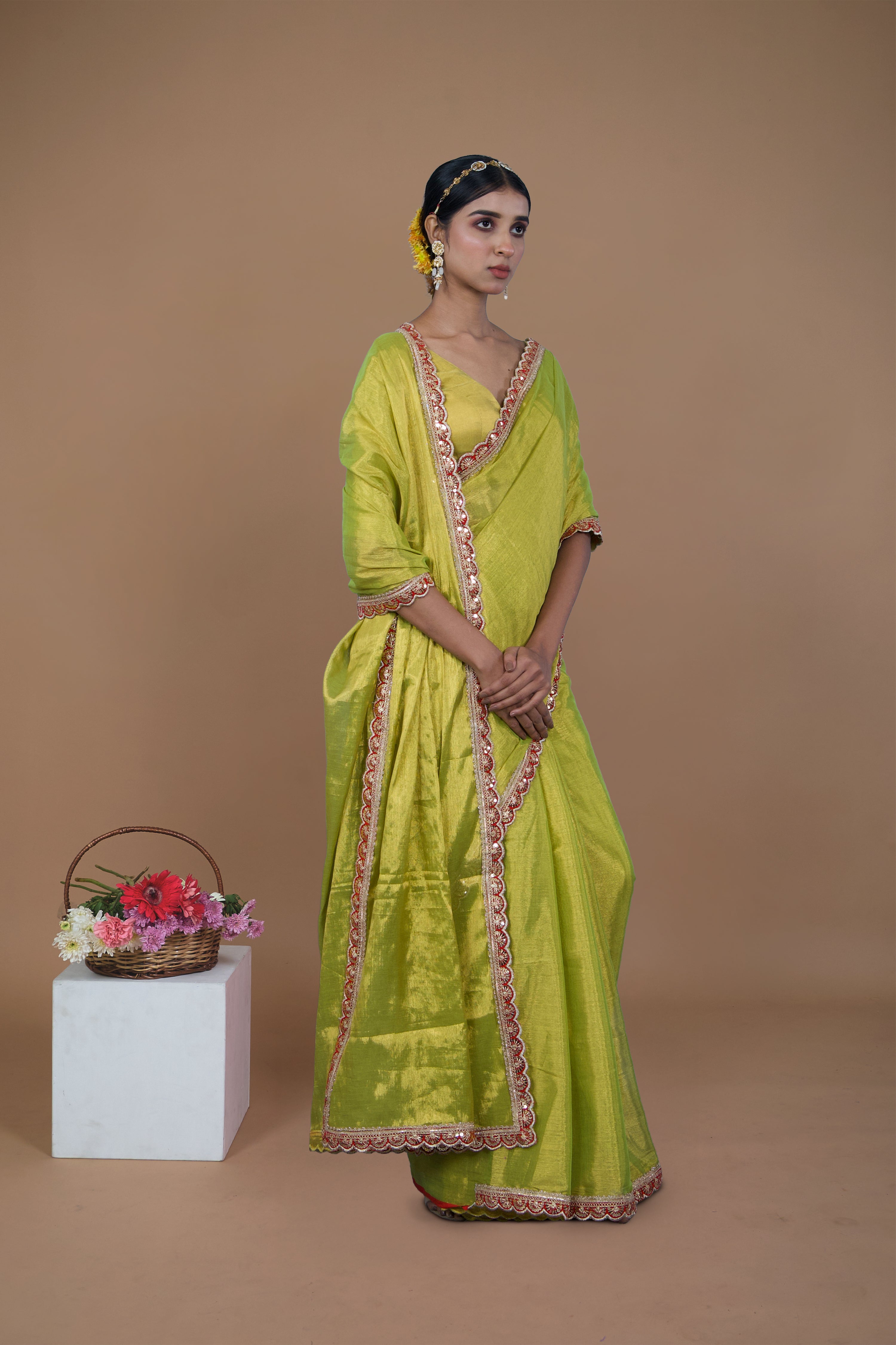 Nirali I Neon green handwoven tissue saree with scalloped lace