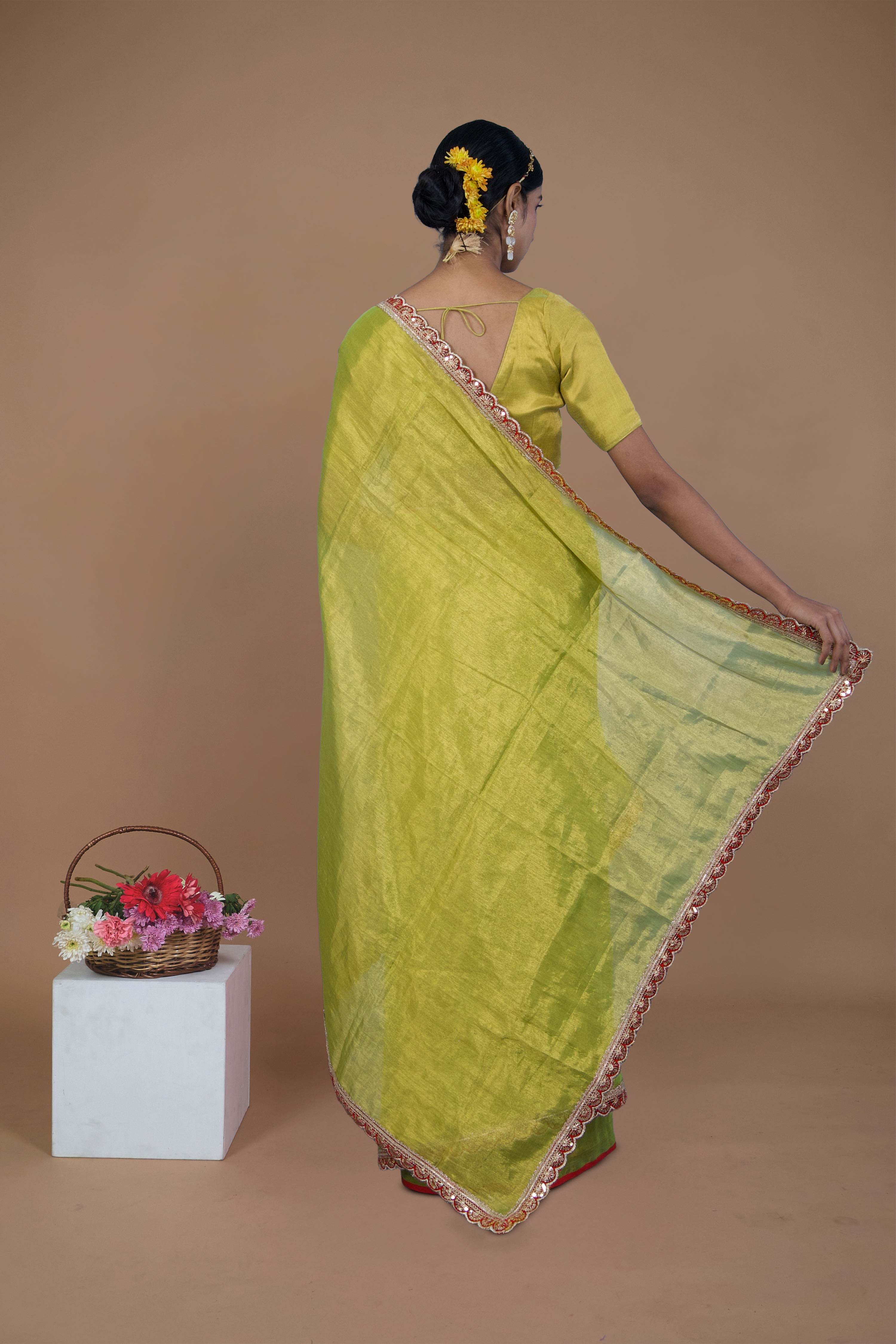 Nirali I Neon green handwoven tissue saree with scalloped lace