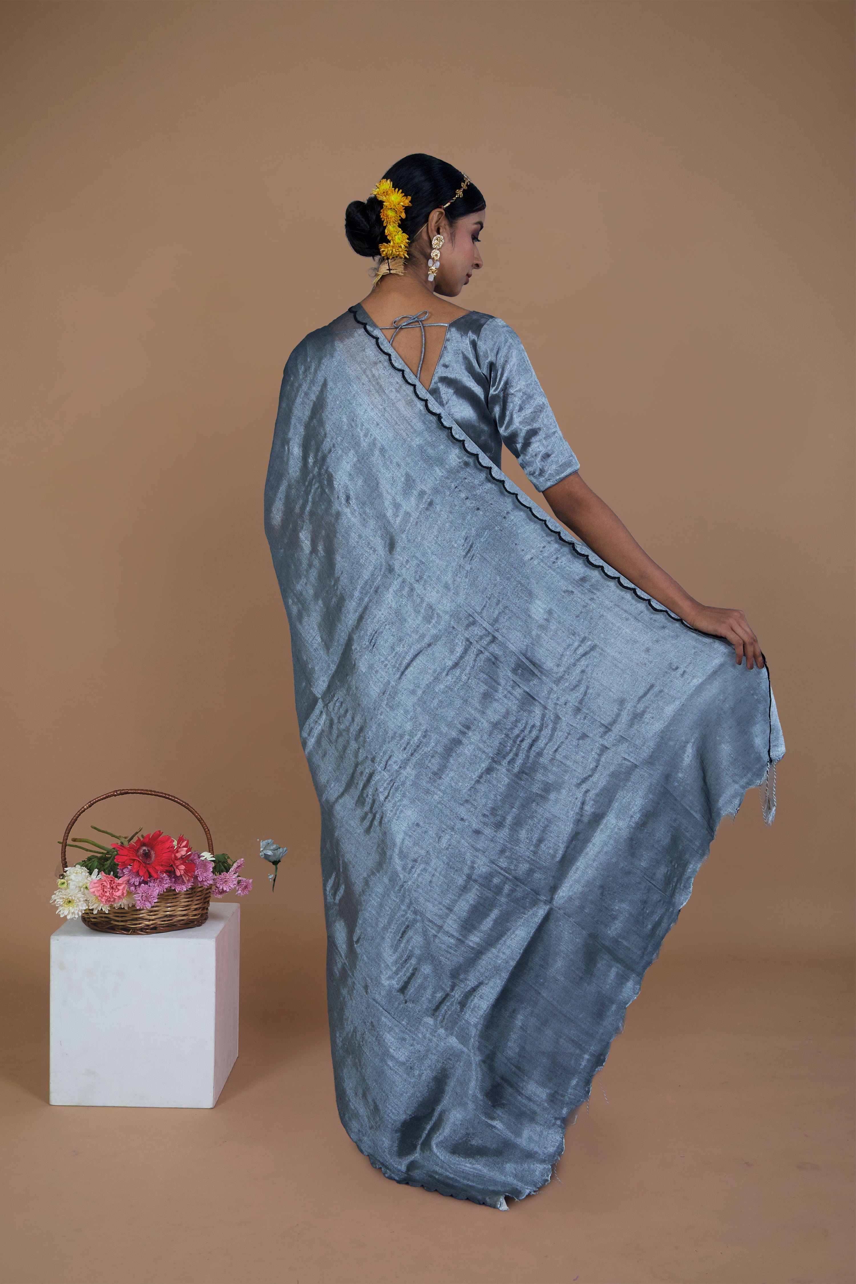 Dhruvi I Silver handwoven tissue saree with scalloped pallu and border