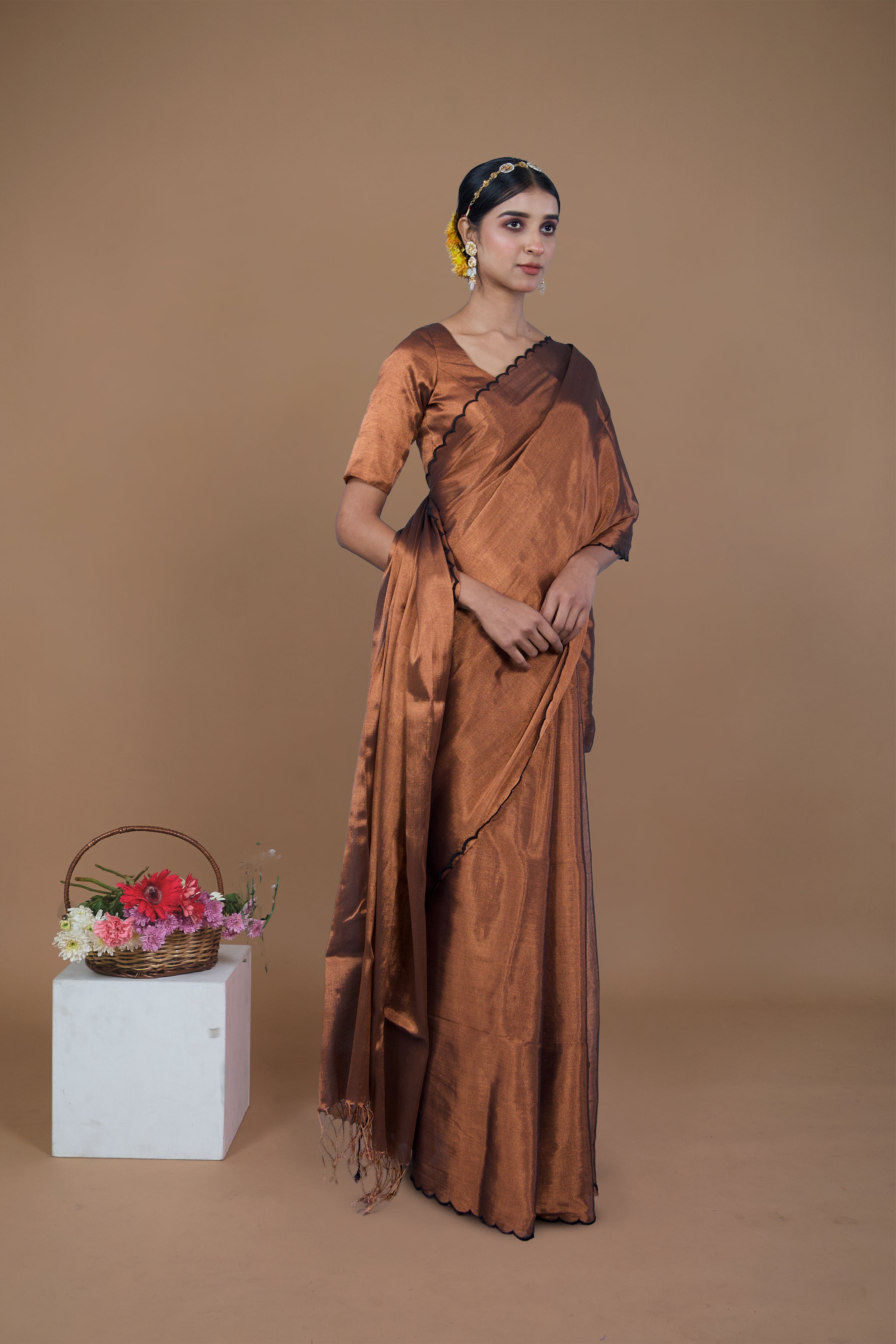Shaili I Copper handwoven tissue saree with scalloped pallu and border