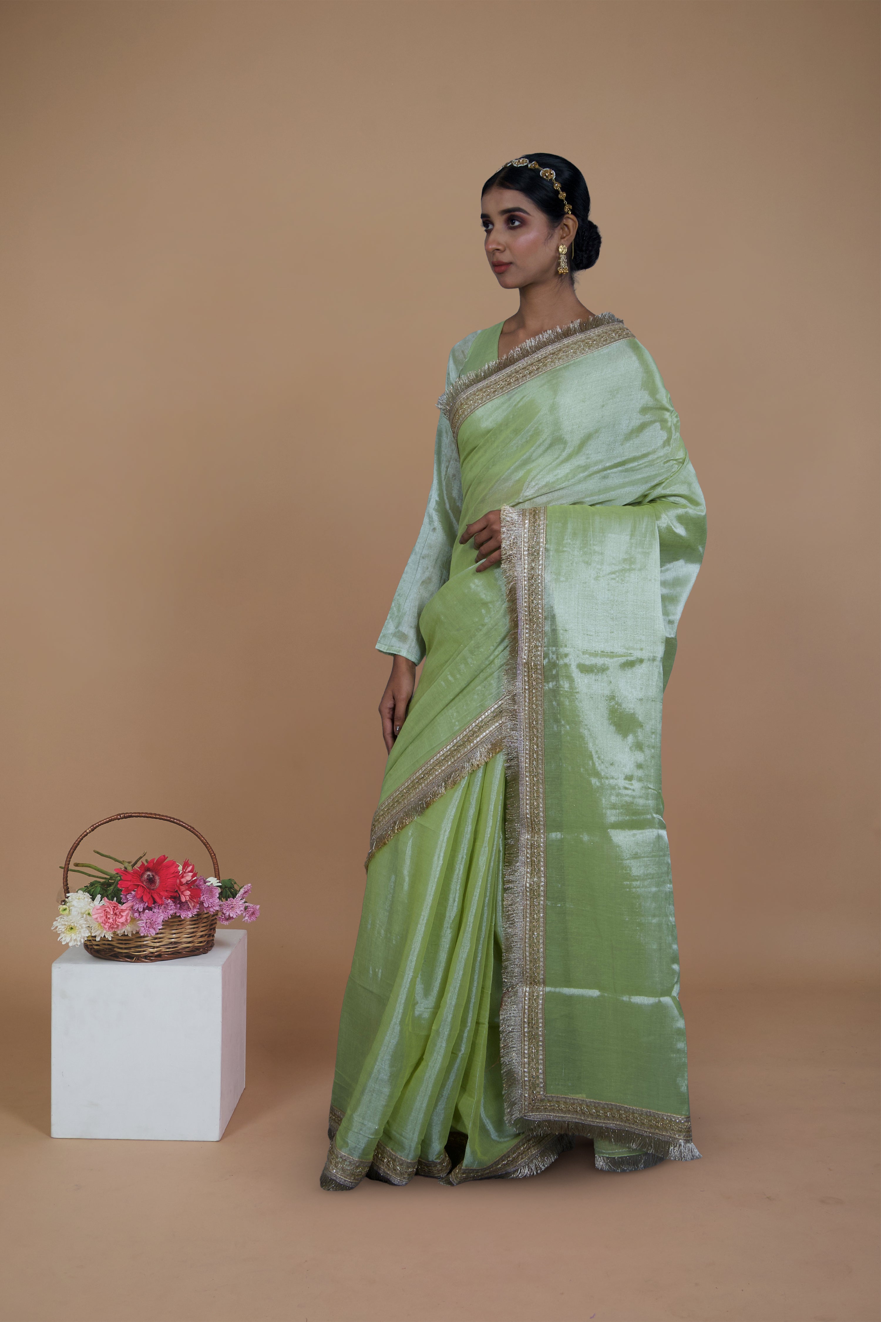 Mayukha I Neon Green handwoven tissue saree with matte gold lace