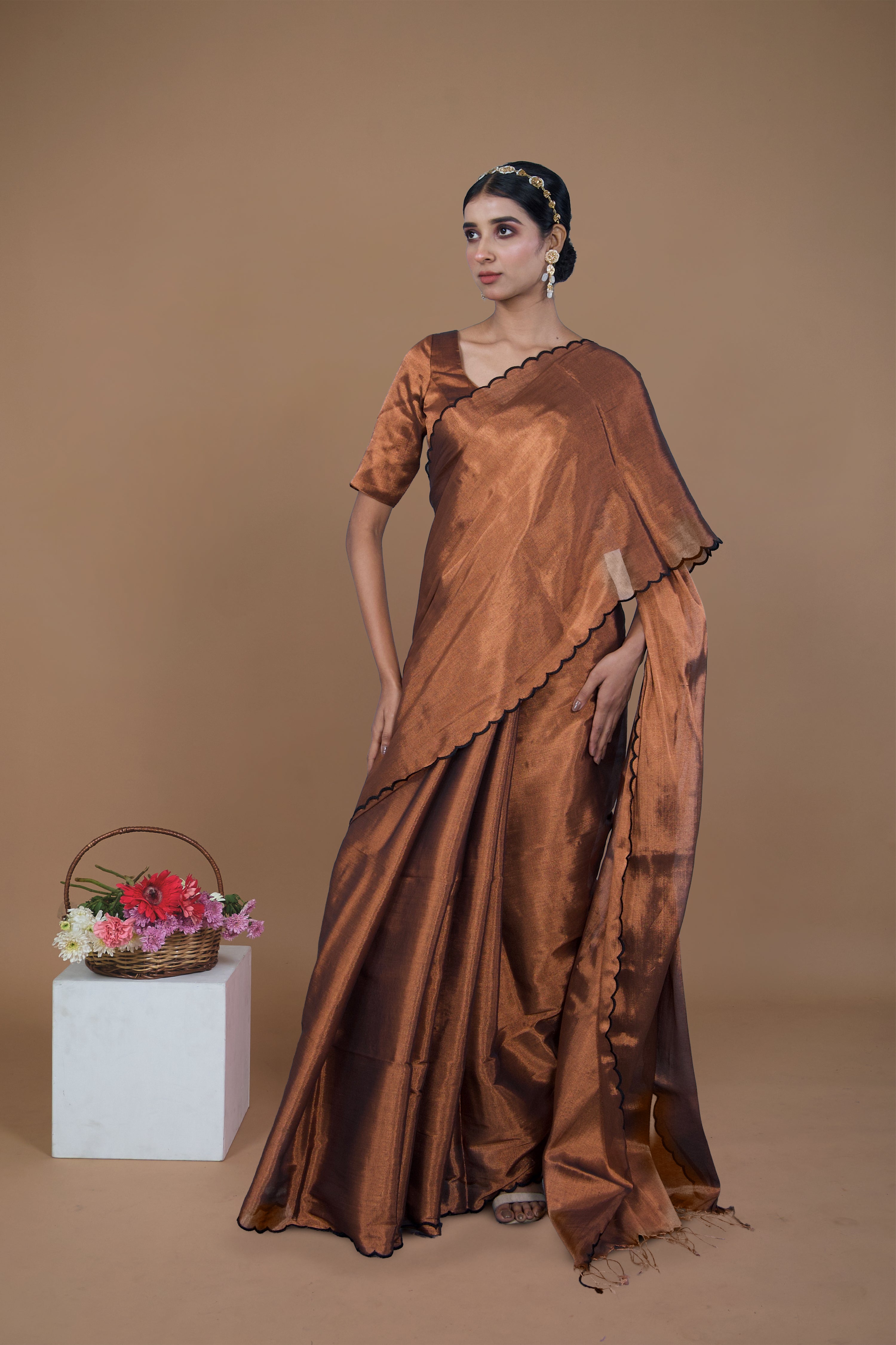 Shaili I Copper handwoven tissue saree with scalloped pallu and border