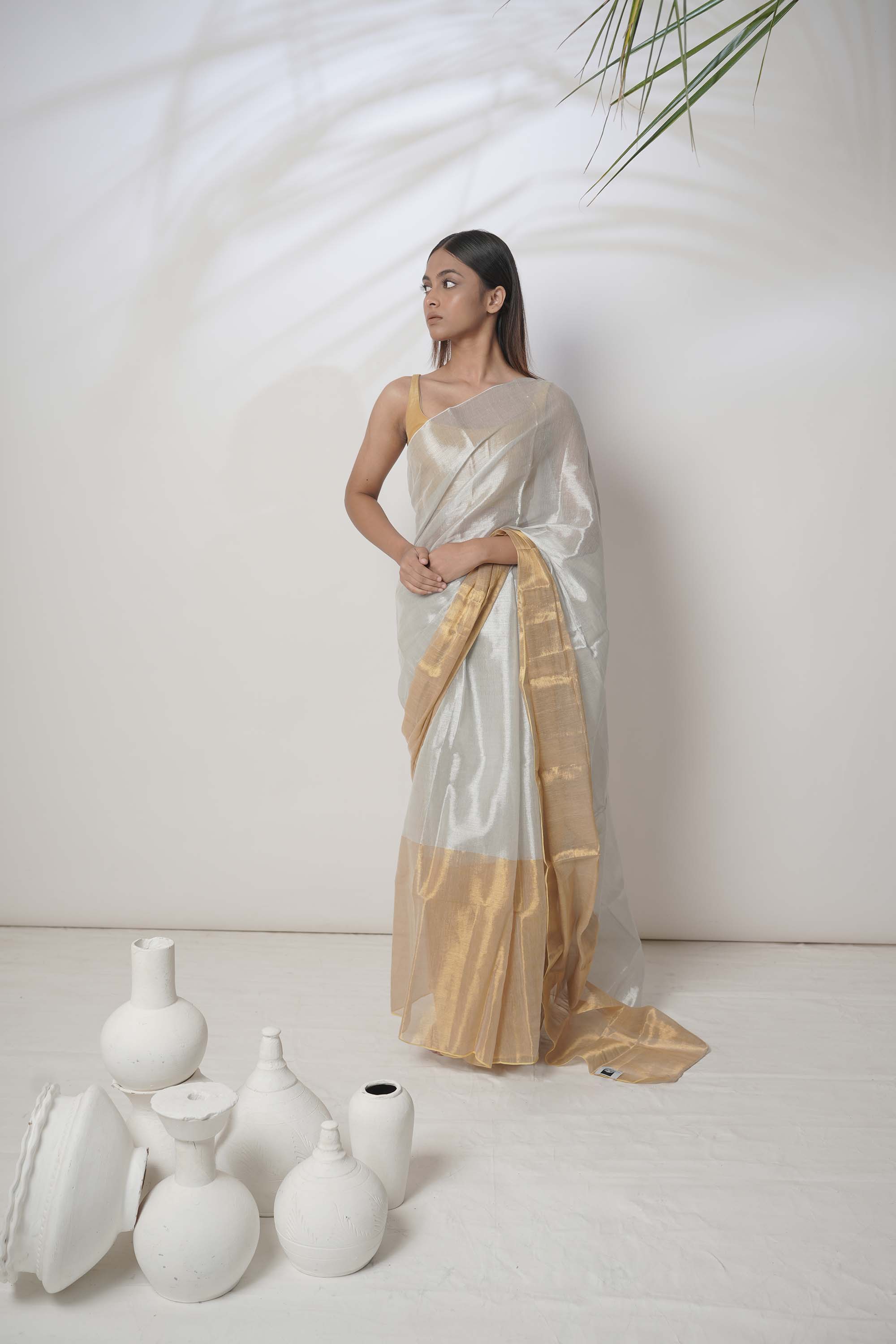 Aarna | Metallic White and Gold Tissue Saree
