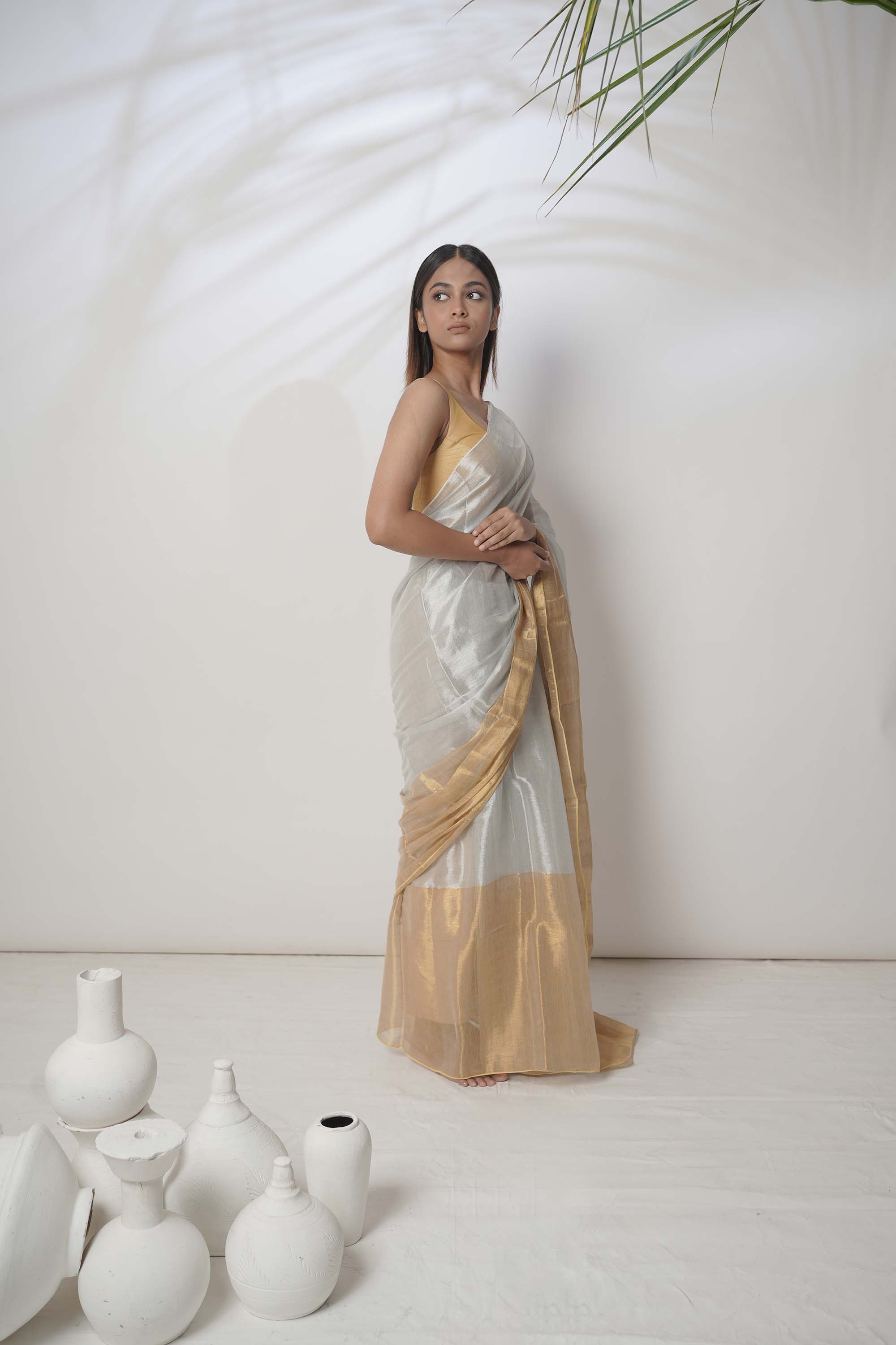 Aarna | Metallic White and Gold Tissue Saree