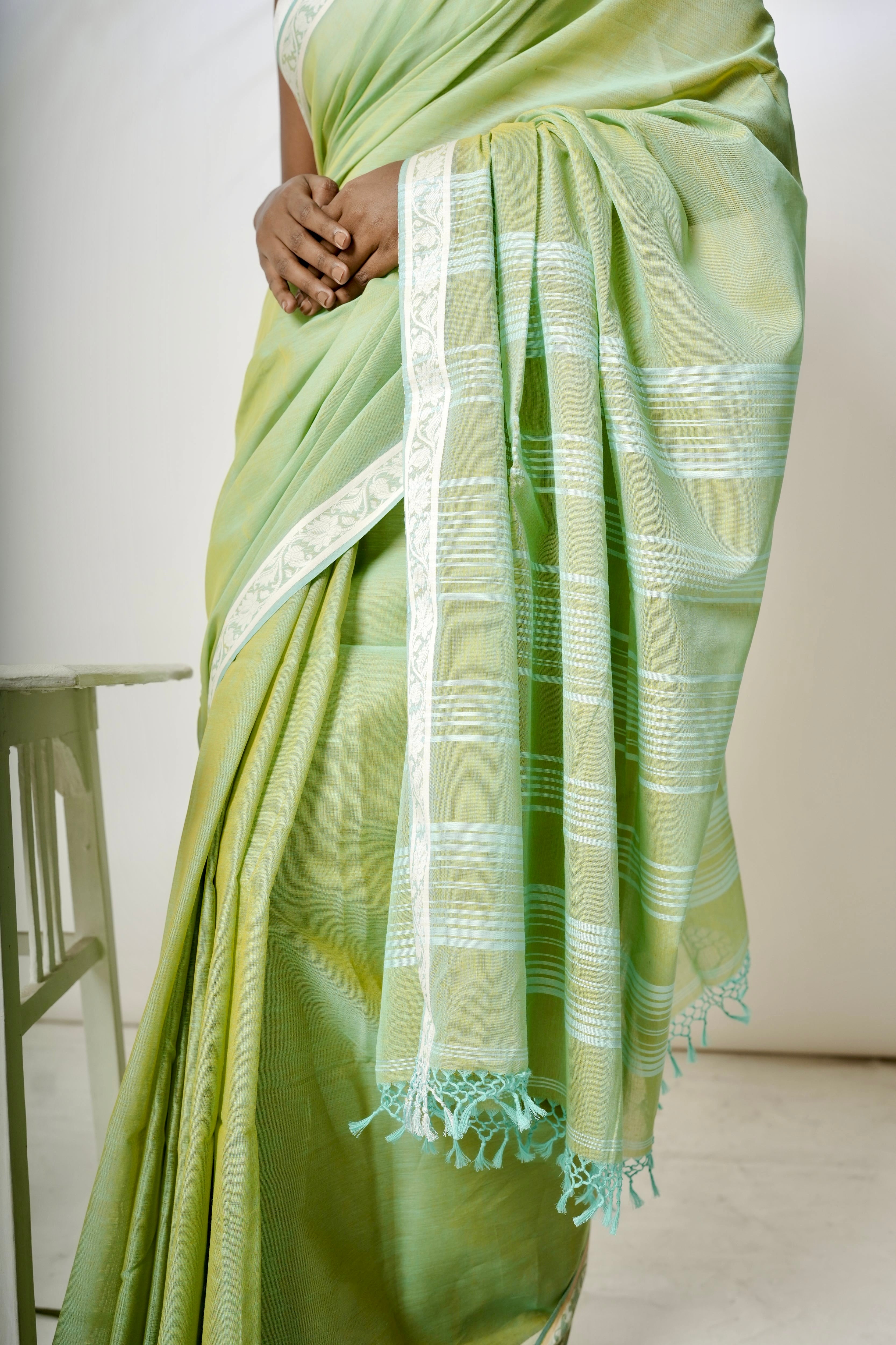 Luminous I  Light green cotton saree with white border