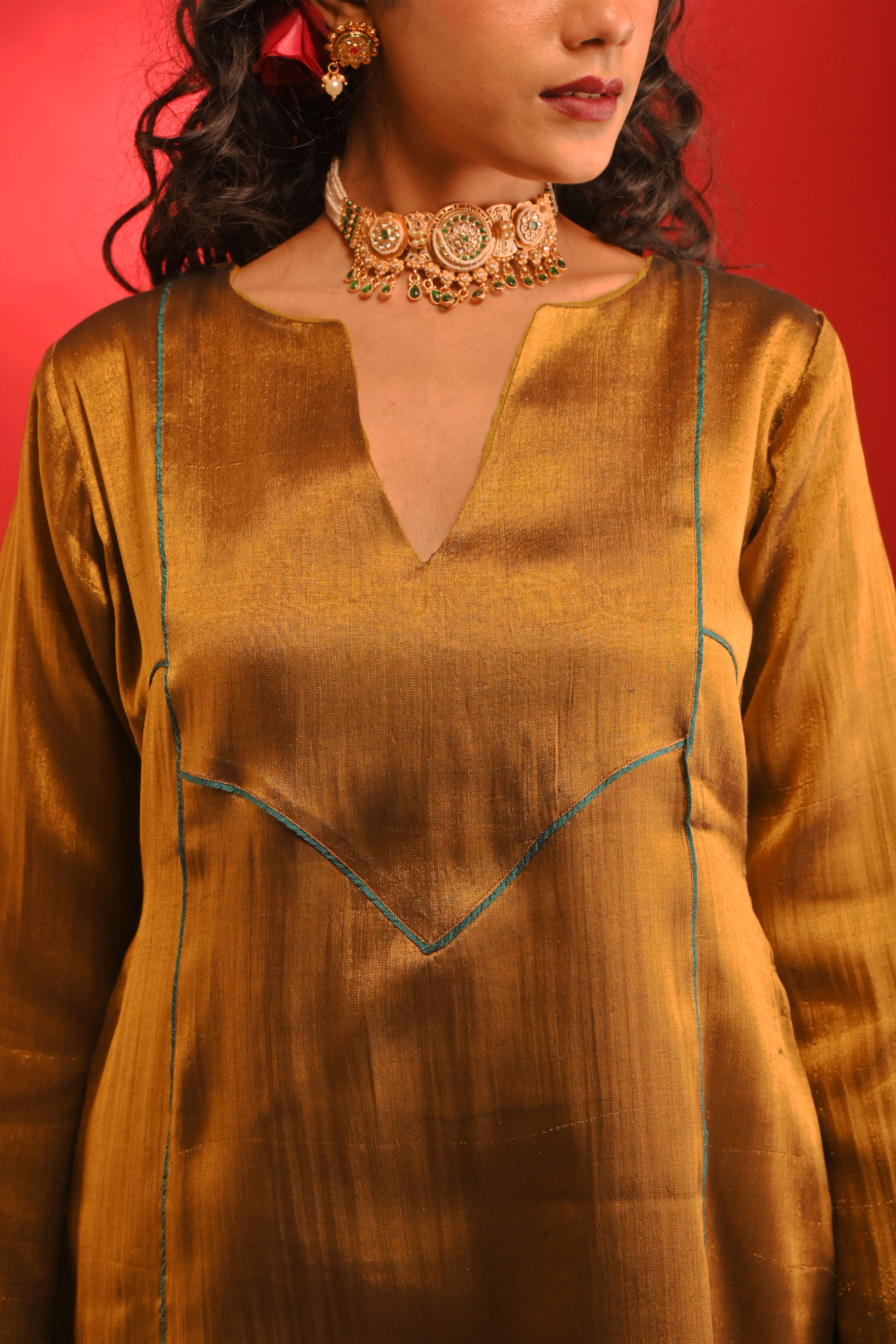 Smritika I Golden handloom tissue kurta pant set with green piping