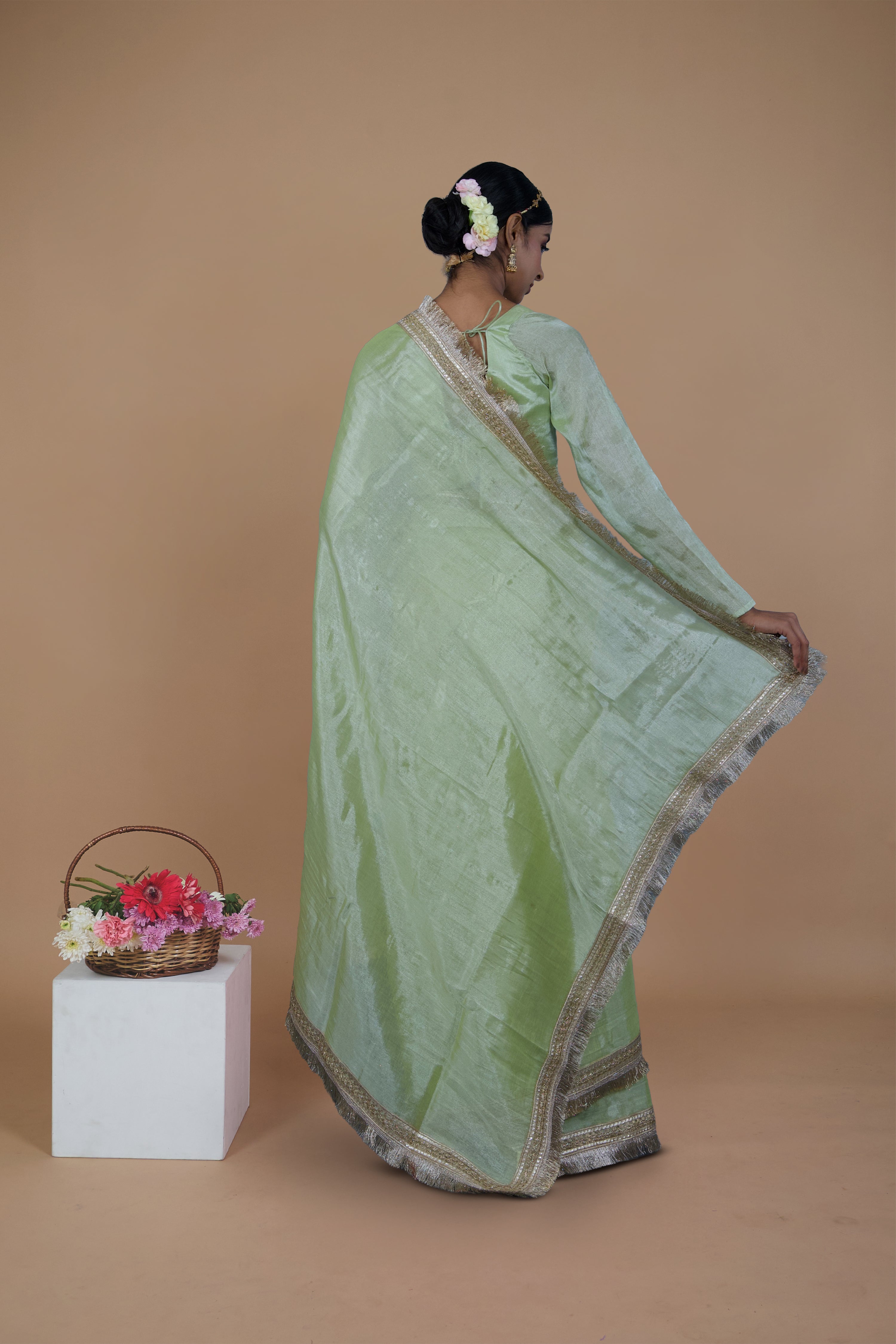 Mayukha I Neon Green handwoven tissue saree with matte gold lace