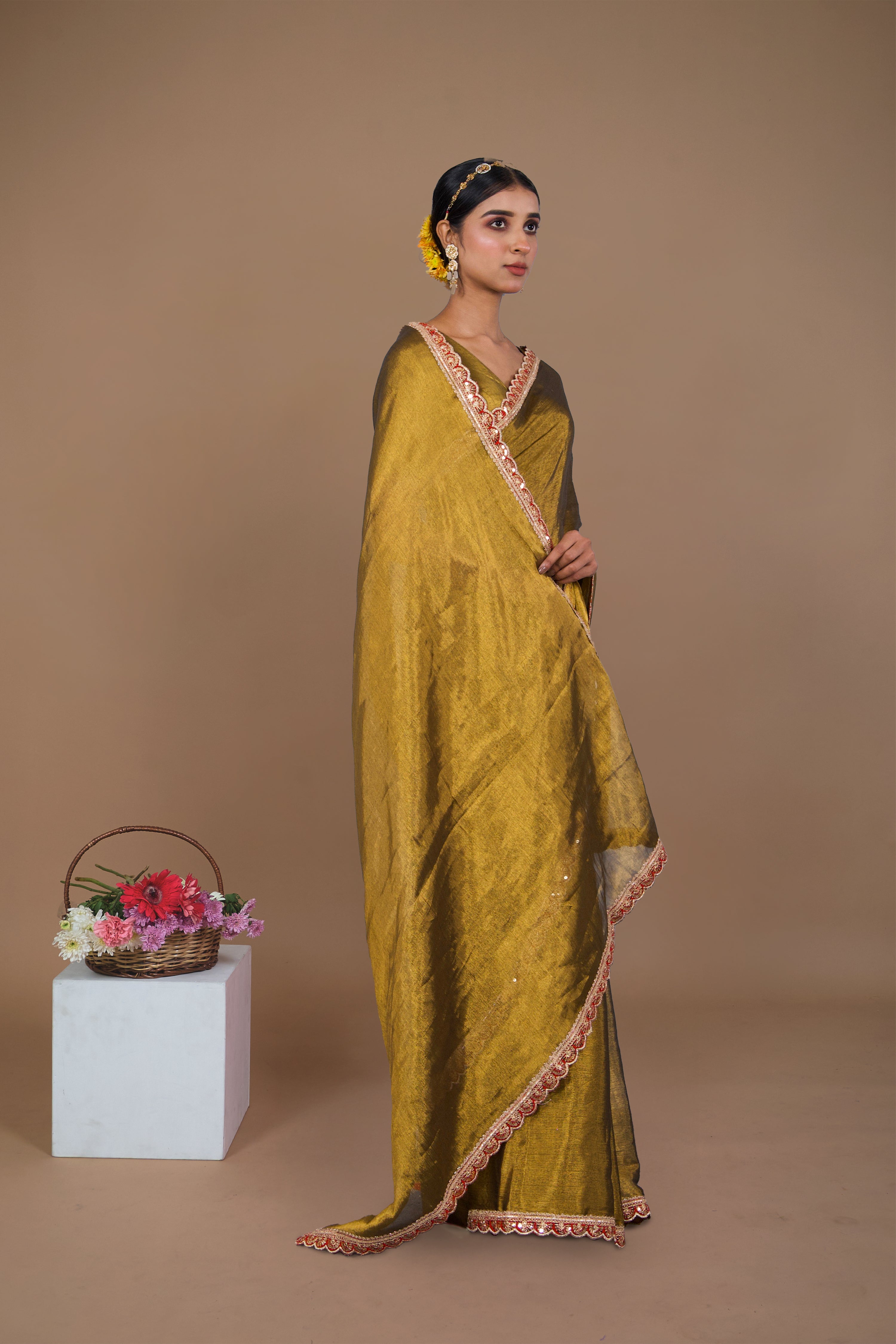 Swarnima I Golden handwoven tissue saree with red scalloped lace