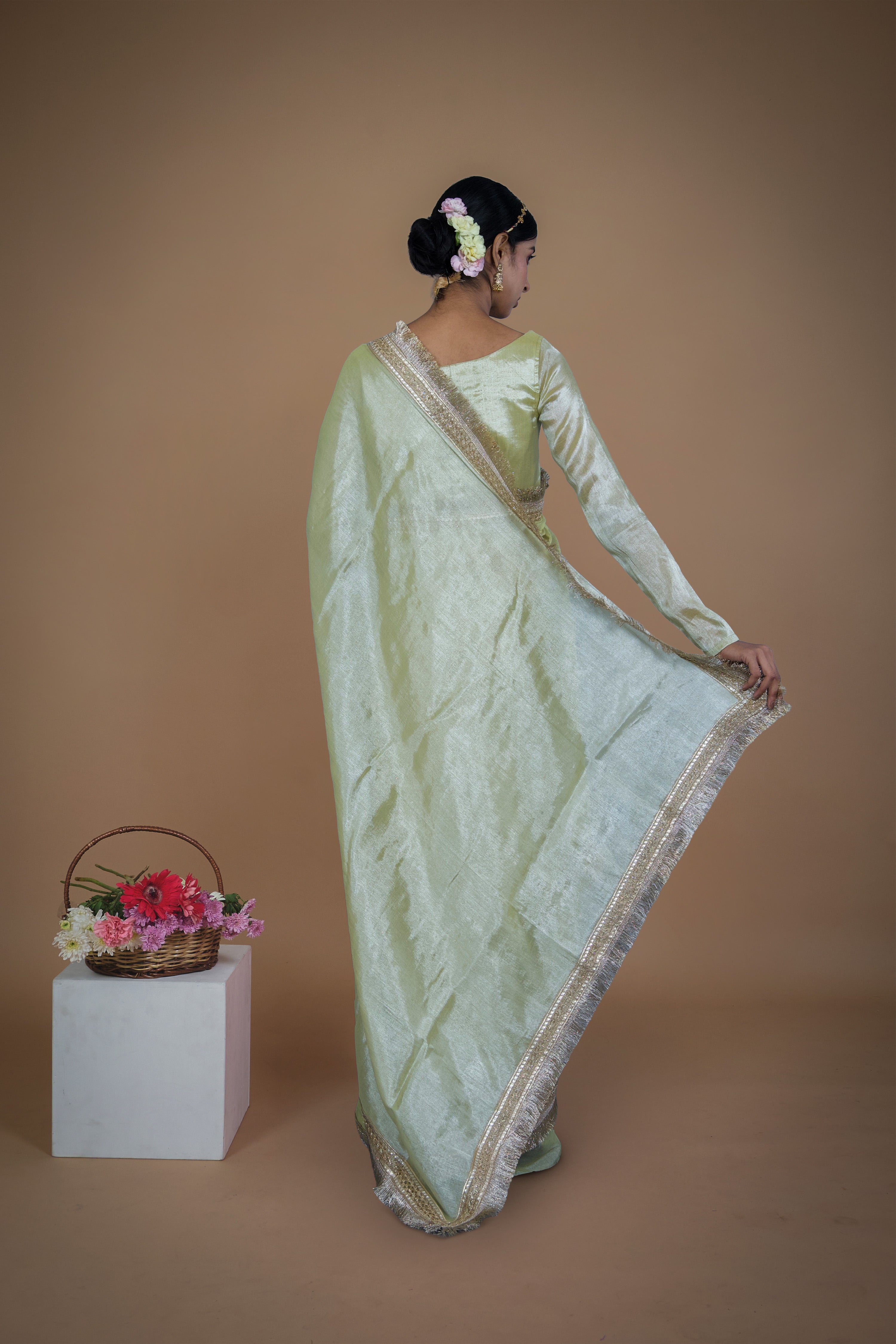 Sampada I Neon Olive handwoven tissue saree with matte gold lace