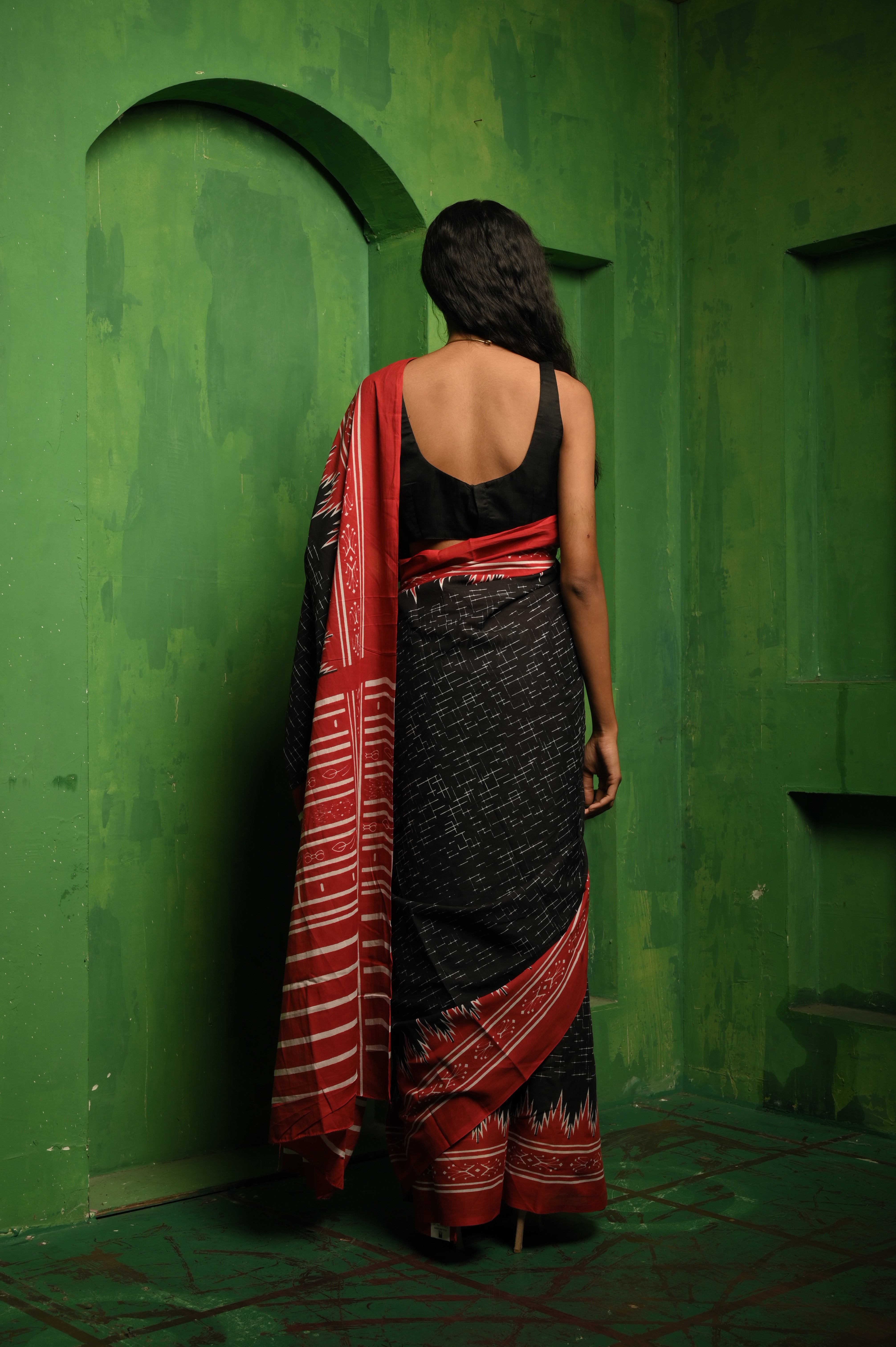 Sangvi I Black printed cotton saree with a red border