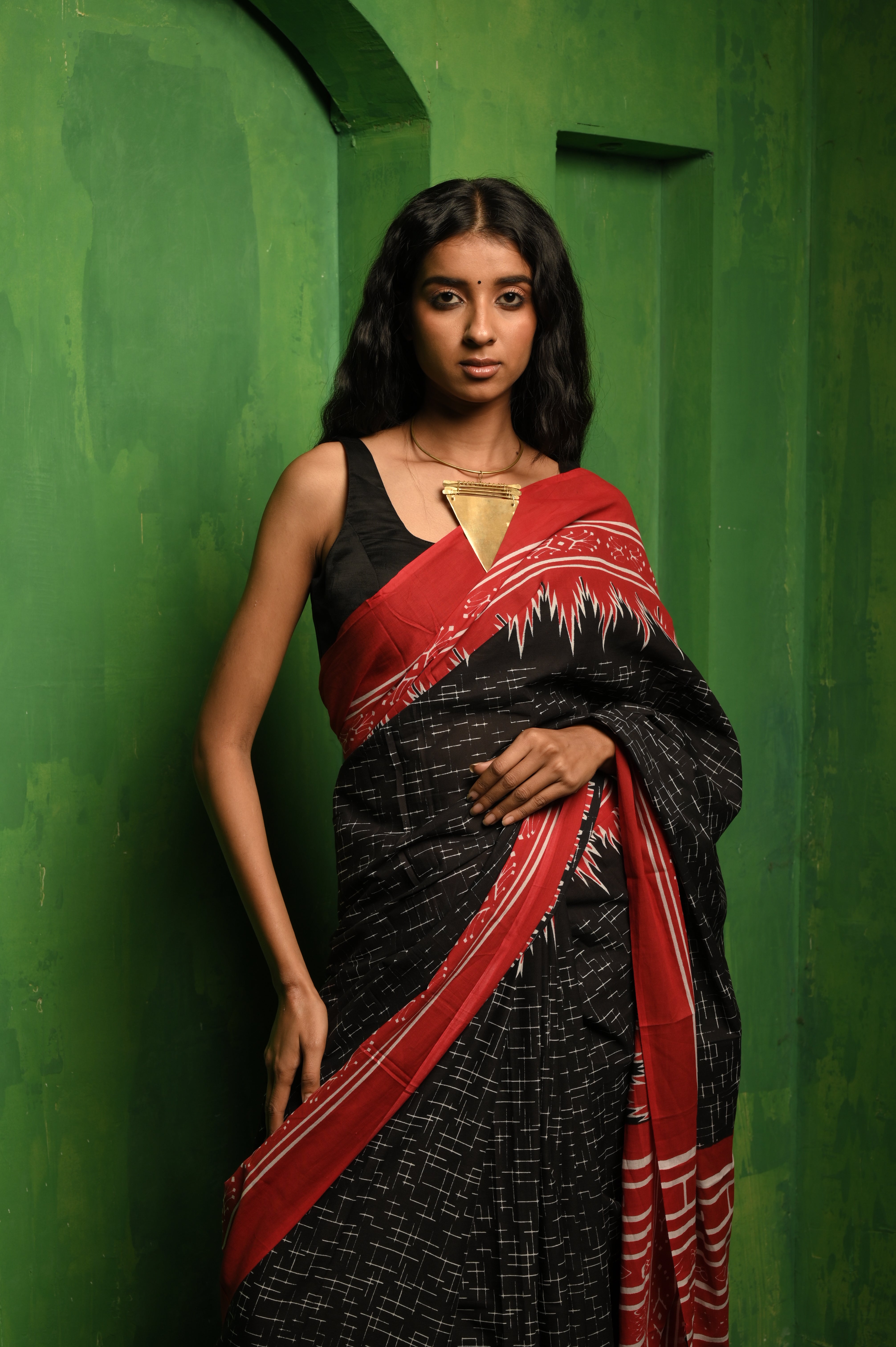 Sangvi I Black printed cotton saree with a red border